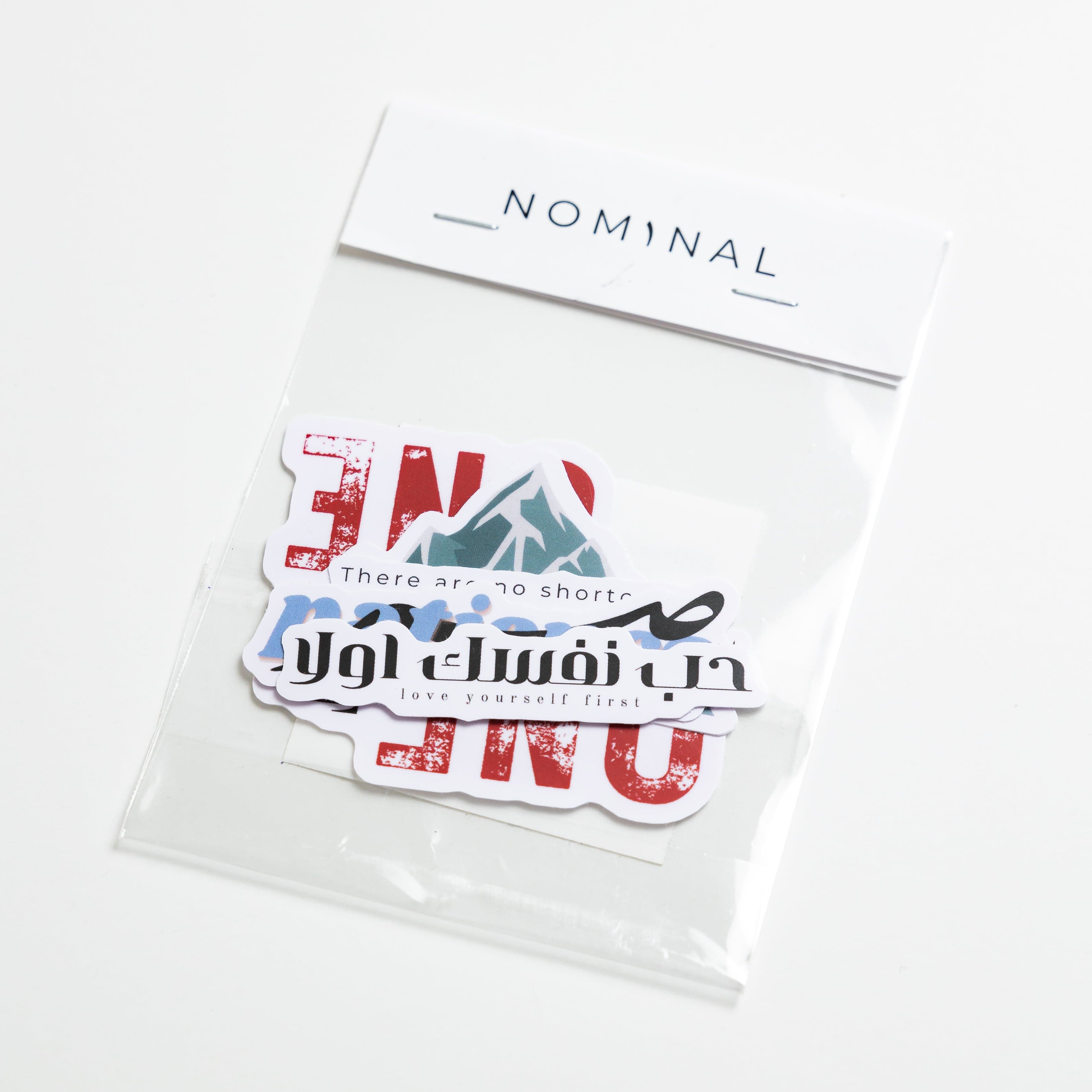 Close-up of the Inspiring Affirmation Sticker Set on a journal, showcasing the motivational designs.