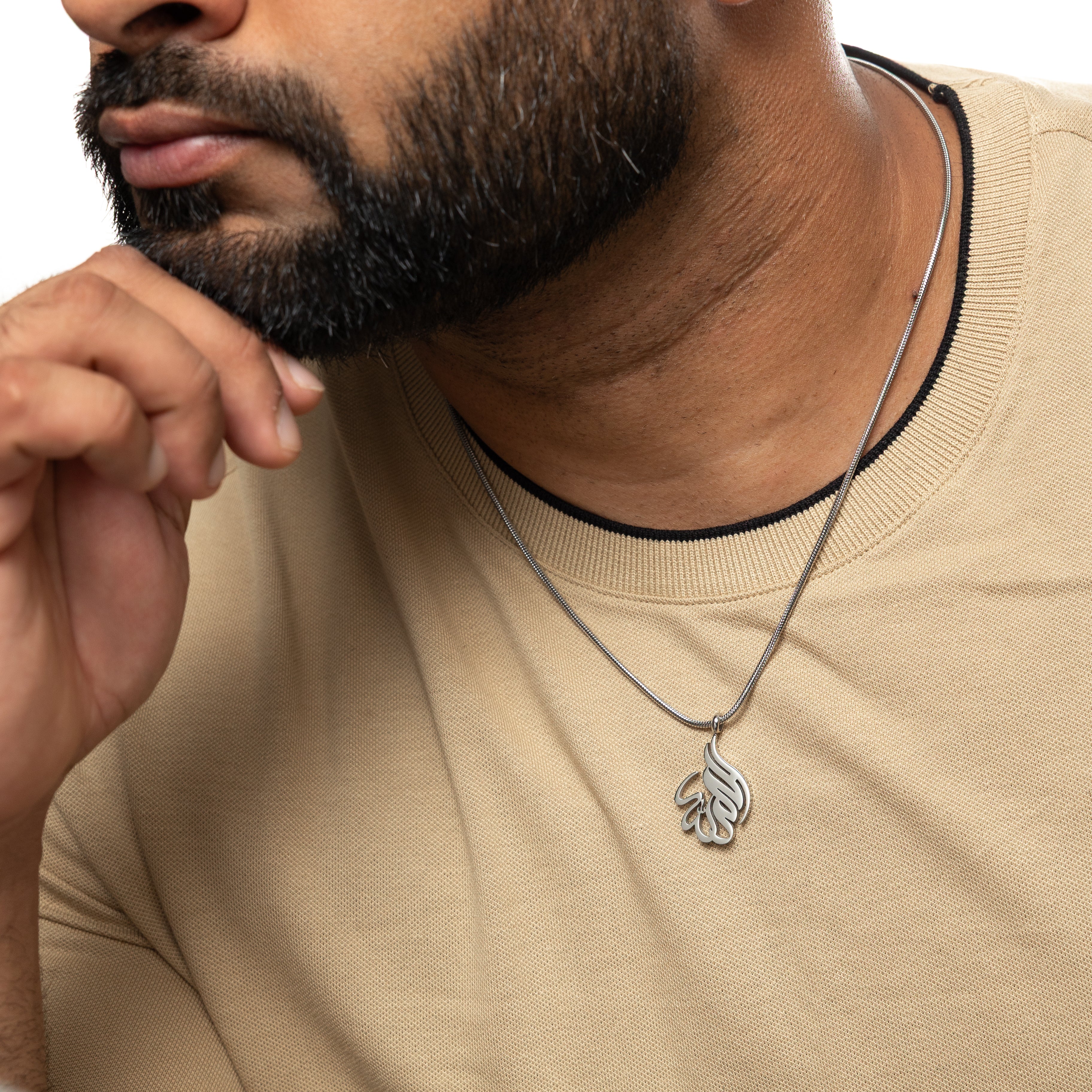 Alhamdulillah necklace displayed in a velvet pouch, emphasizing its gift-ready presentation.