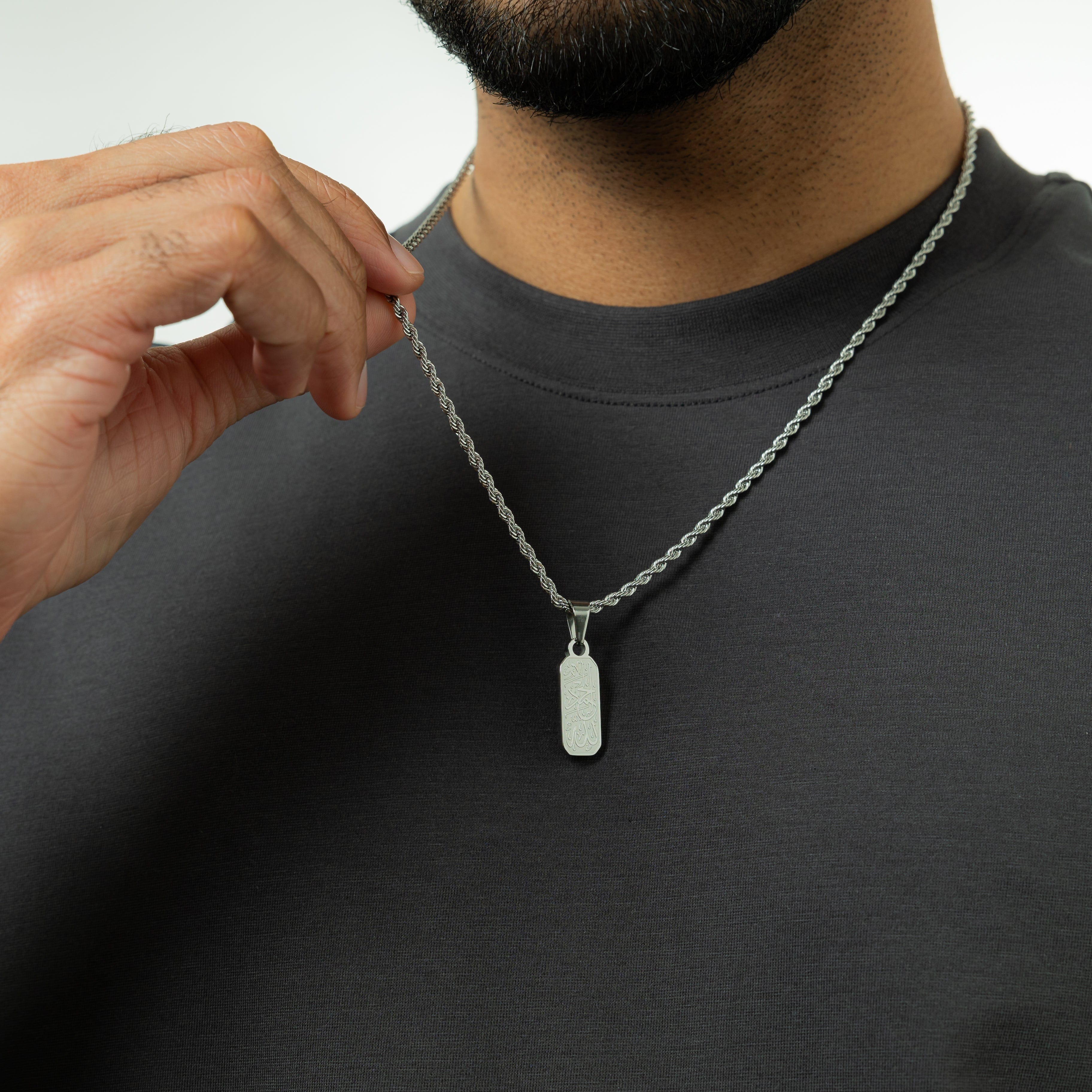 Close-up of the Elegant Alhamdulillah tag necklace showcasing its intricate calligraphy design.