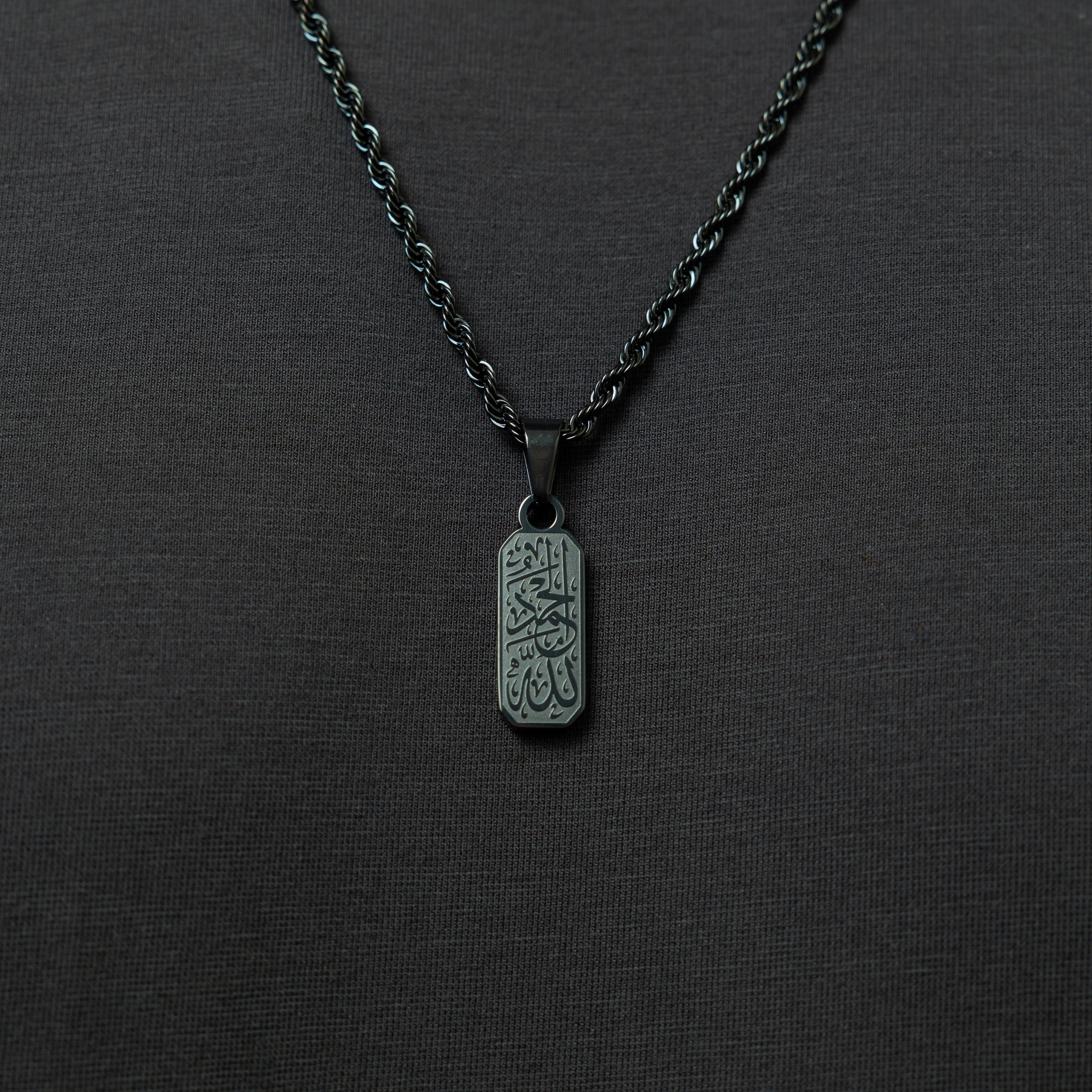 Close-up of the Elegant Alhamdulillah tag necklace showcasing its intricate calligraphy design.
