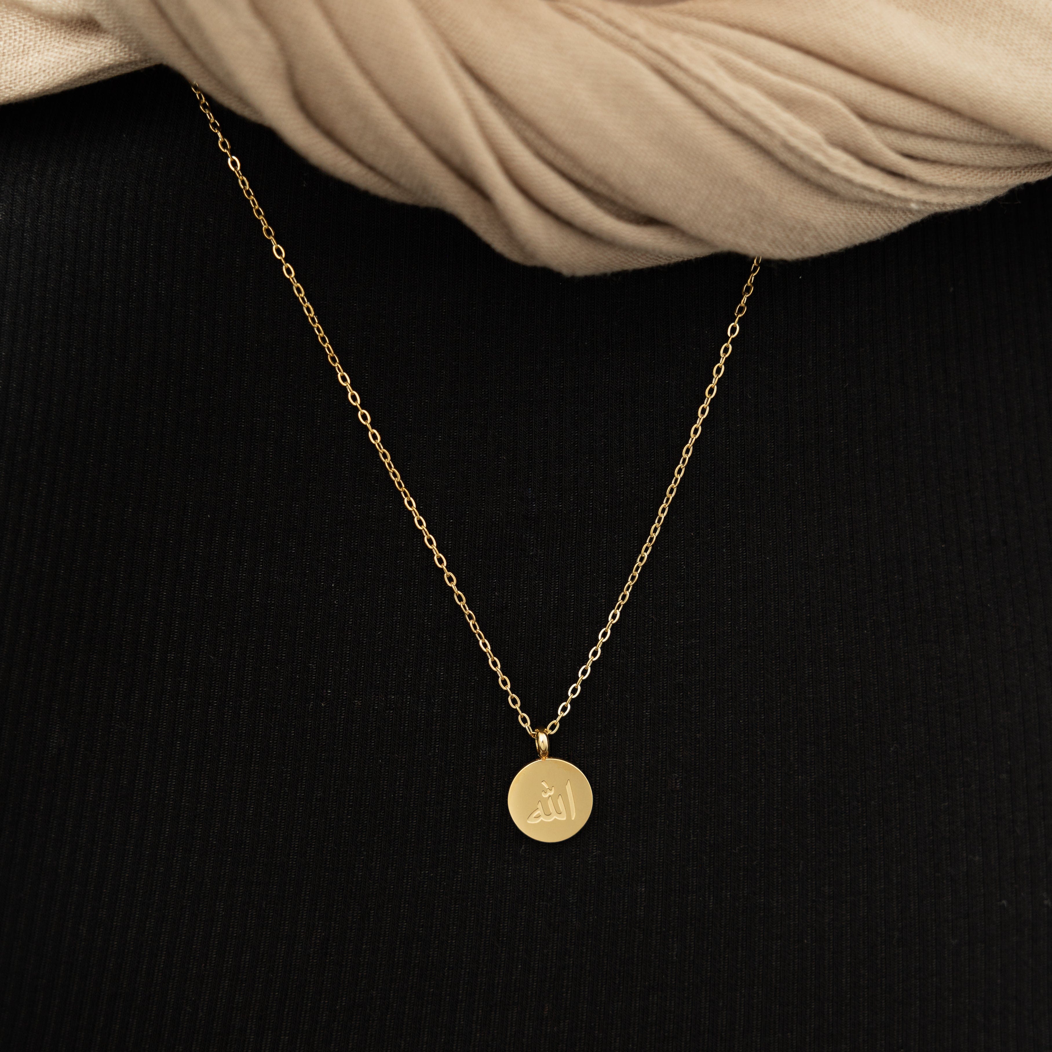 Close-up of the Allah necklace showcasing its 18K gold plating and craftsmanship.
