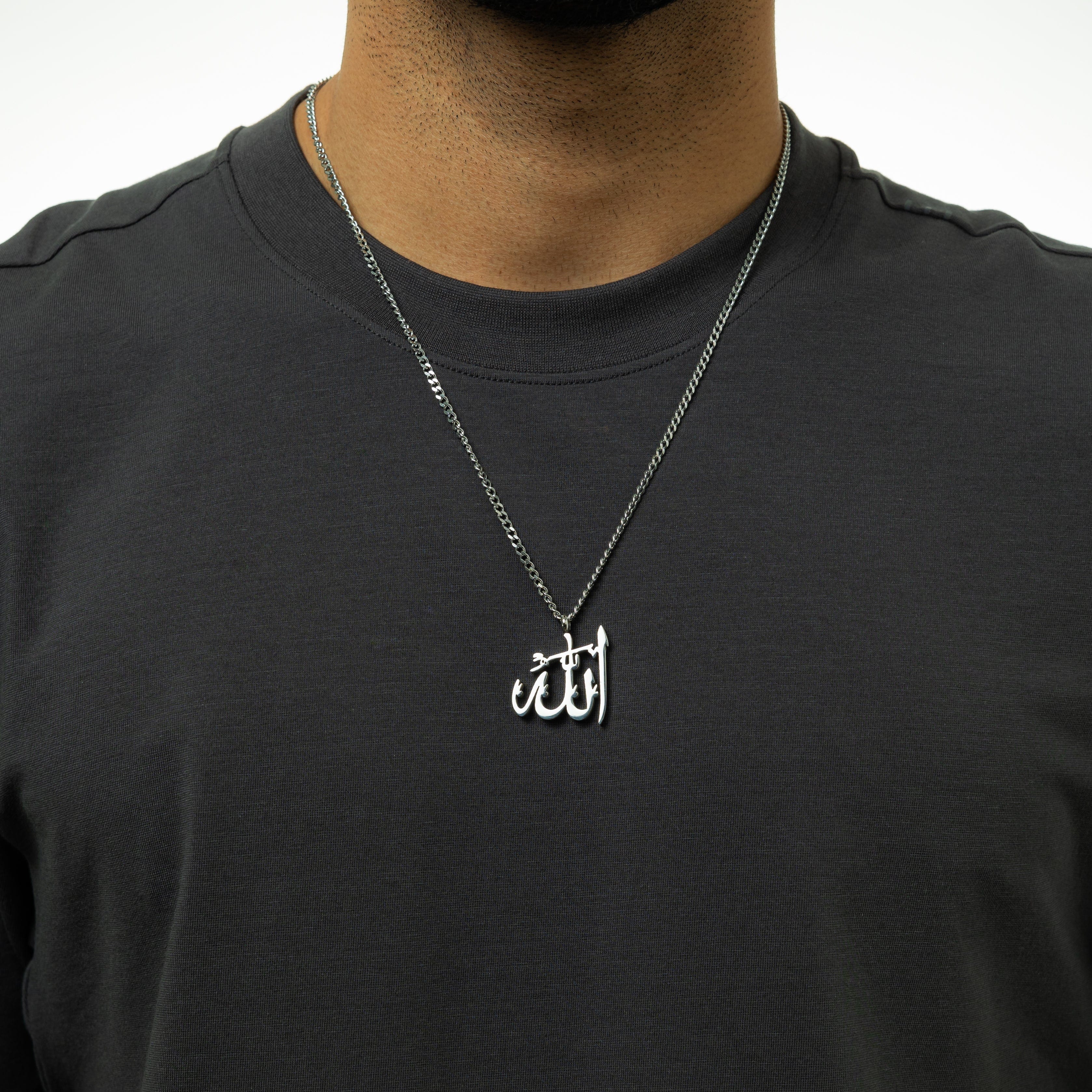 Close-up of the waterproof stainless steel Allah necklace highlighting its calligraphy.