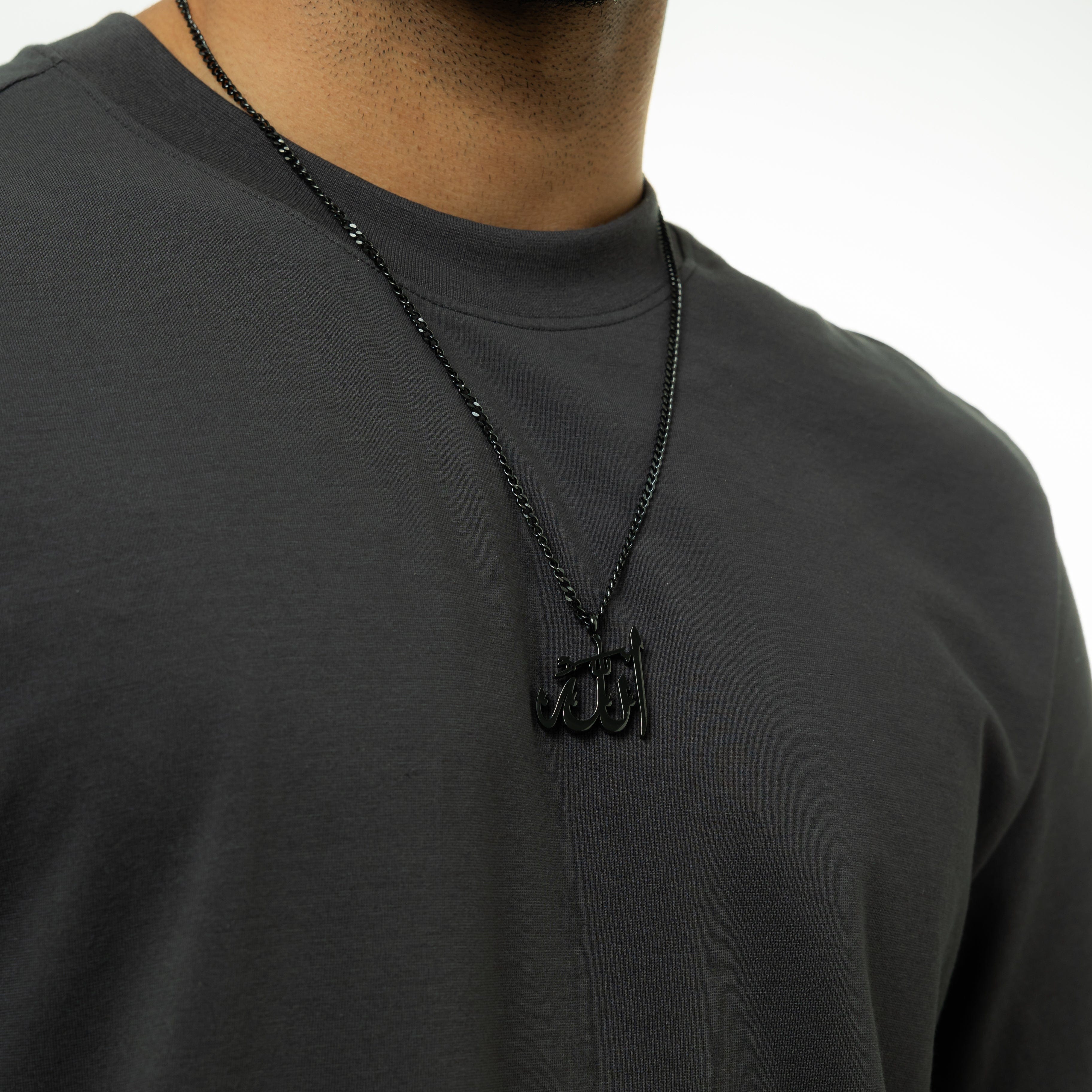 The Allah pendant necklace displayed in a velvet drawstring pouch, ideal for gifting.