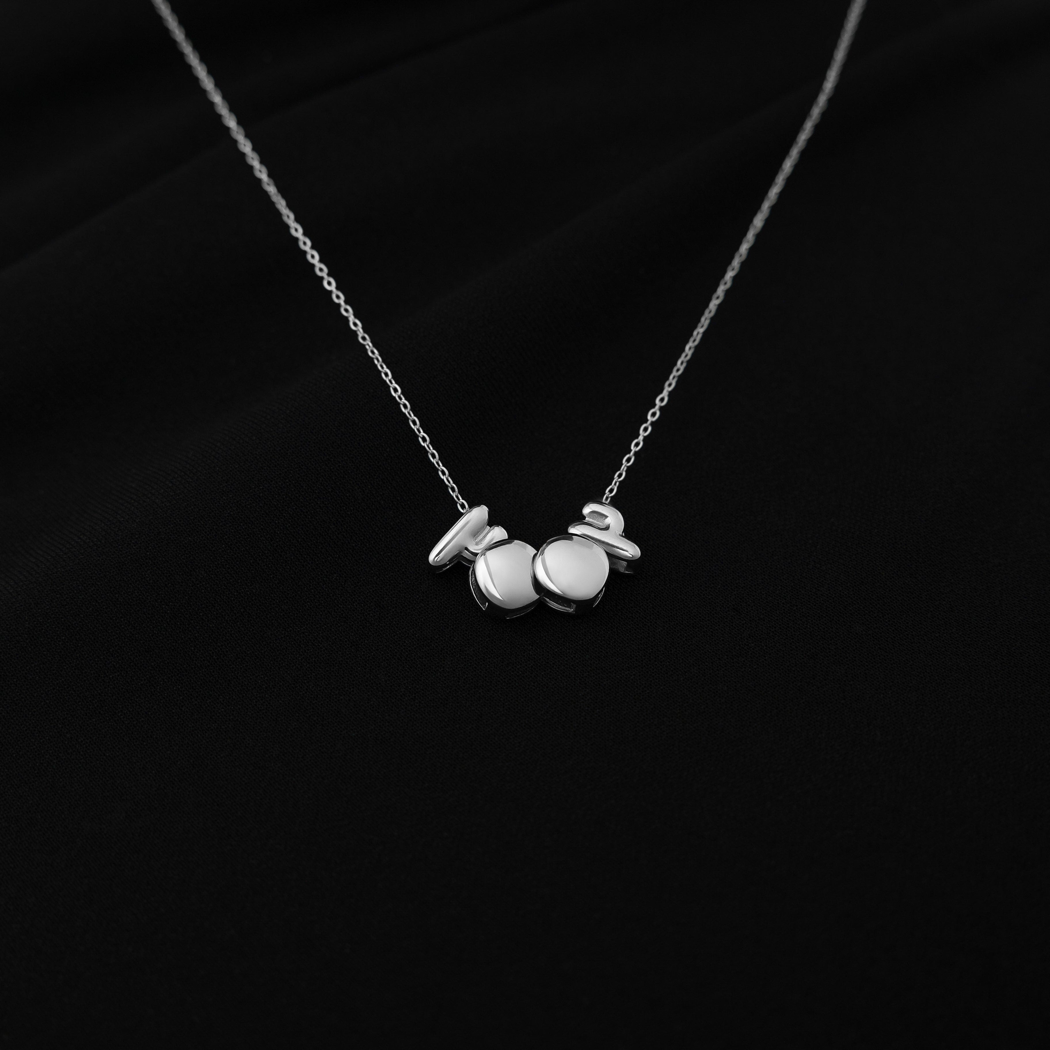 Close-up view of the personalized Arabic birthyear charm necklace showcasing its elegant design.