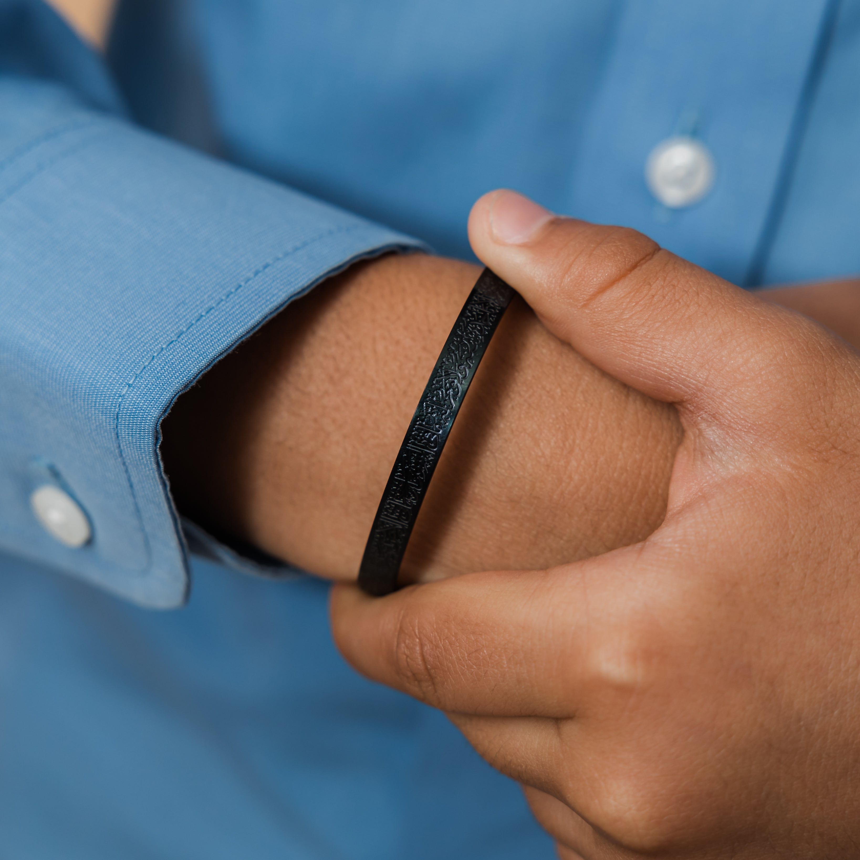 Ayatul Kursi Boys Cuff Bracelet in its velvet pouch.