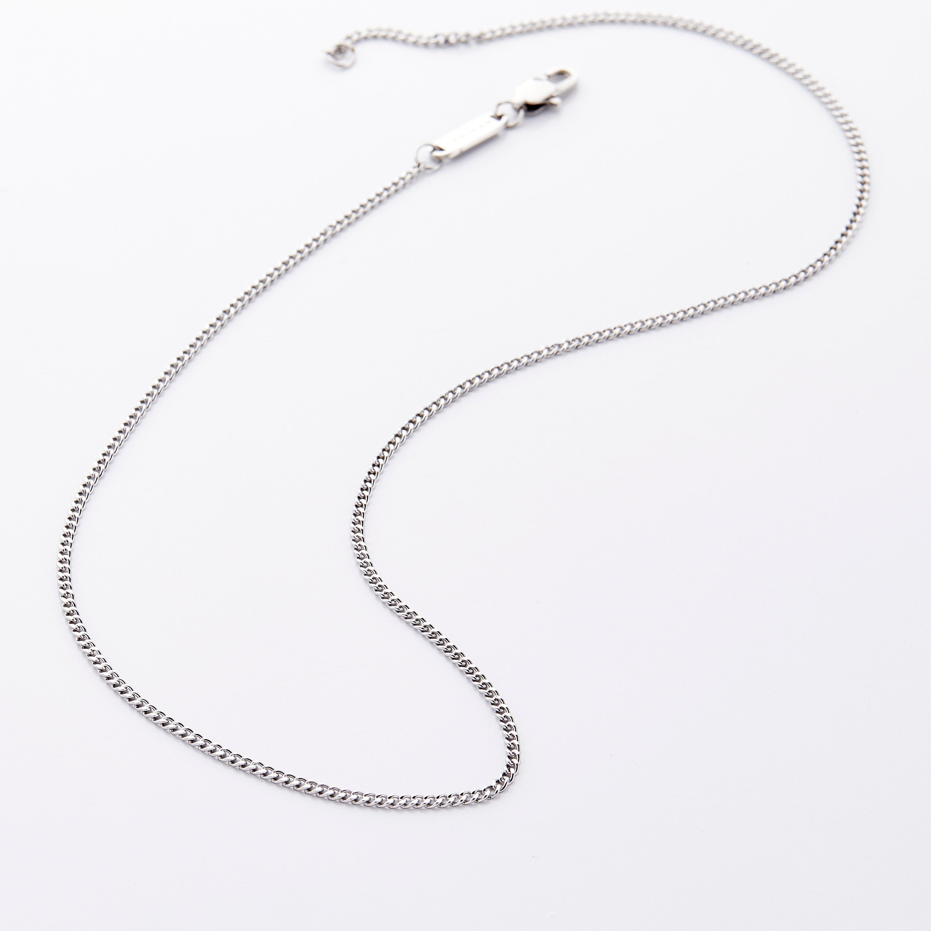 Close-up of the stainless steel Cuban chain necklace for boys, showcasing the uniform links.