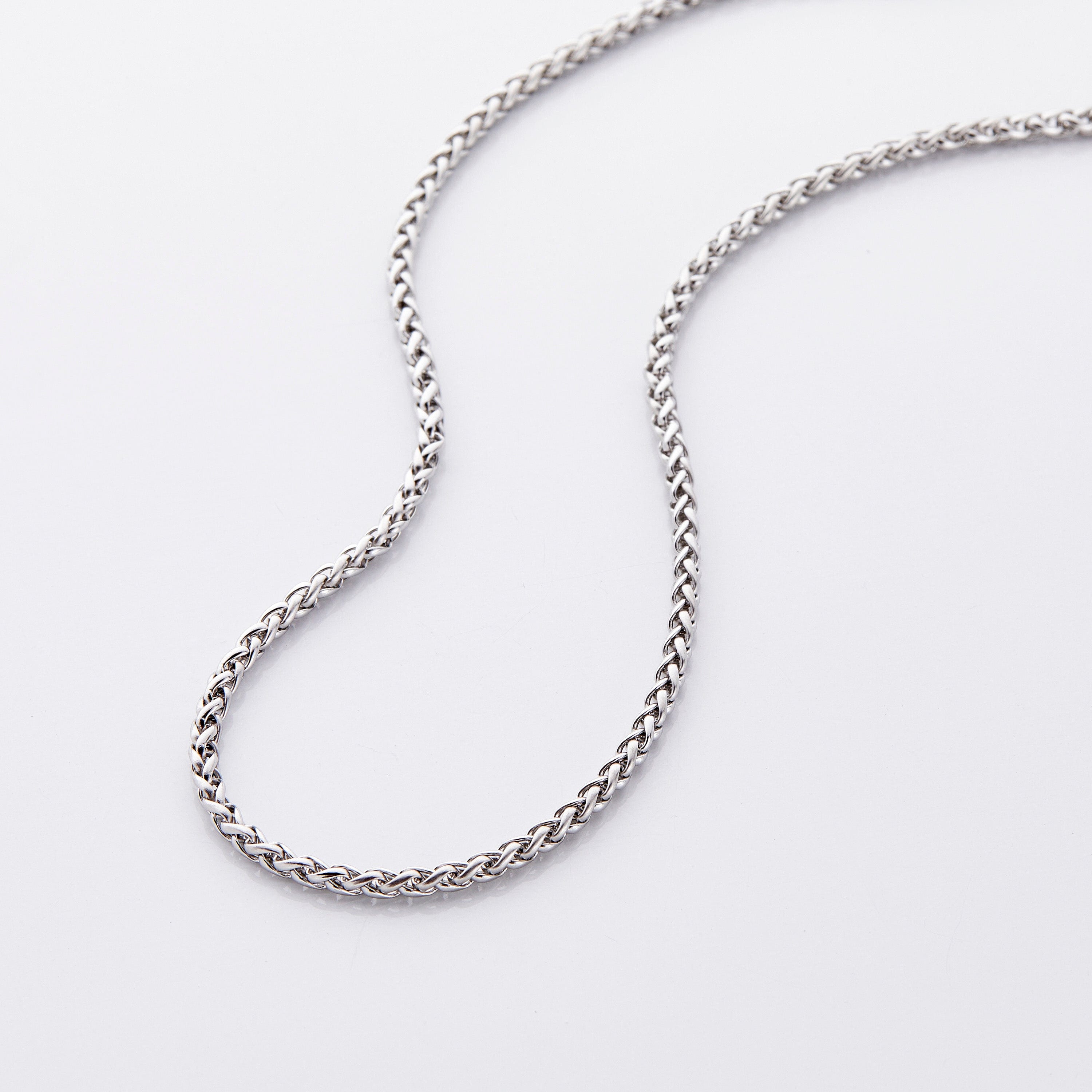 Elegant wheat chain necklace for boys, showcasing its unique spiral design.
