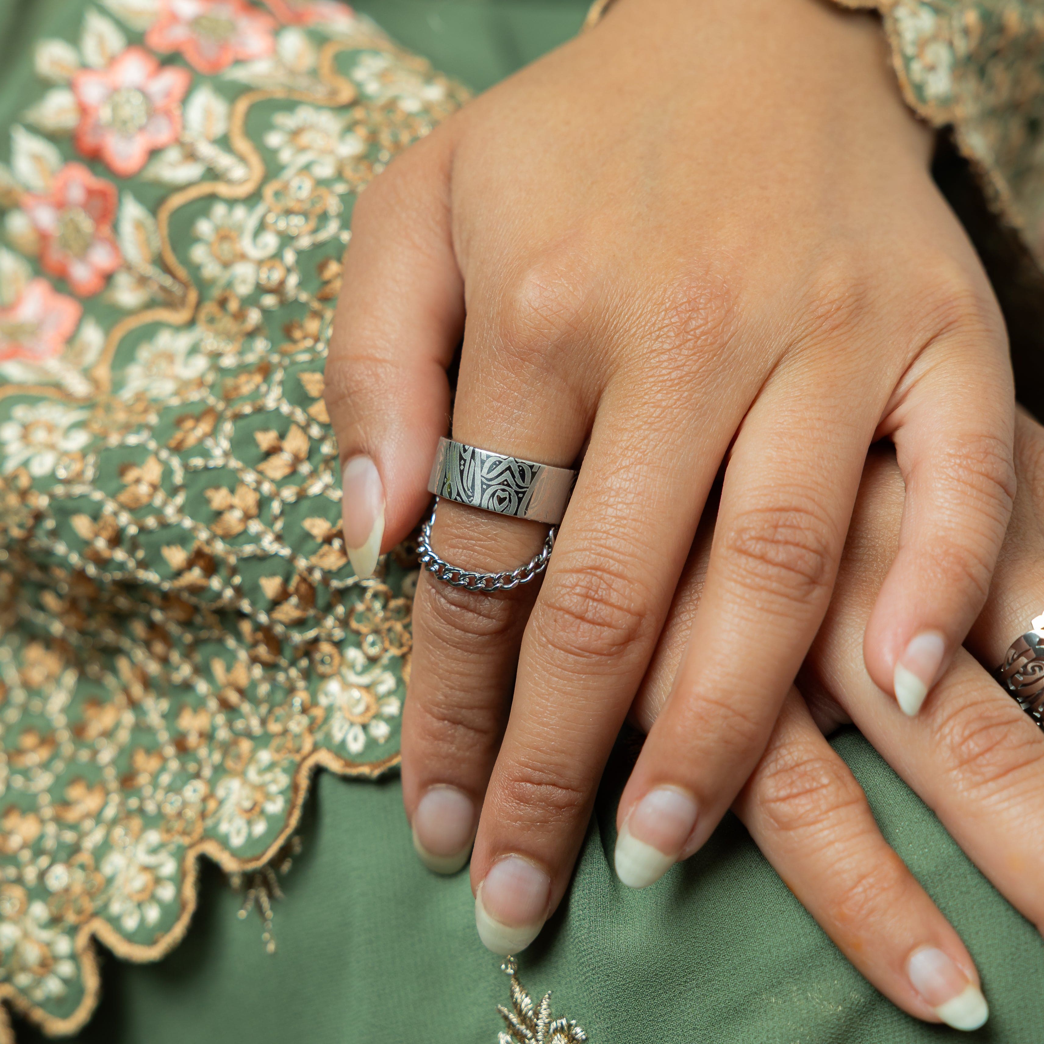 Unity Gold Ring showing the engraved calligraphy, perfect for sensitive skin