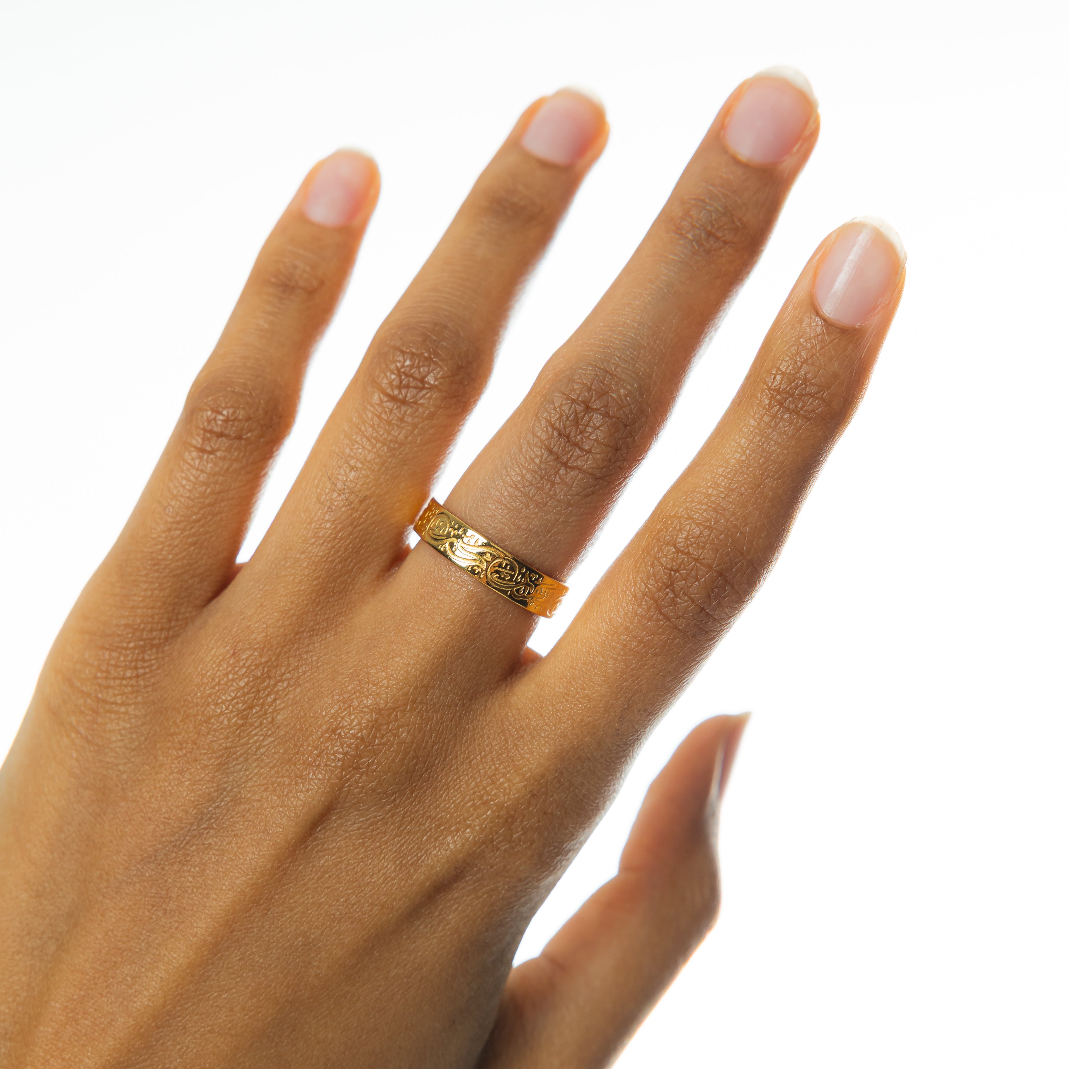 Rumi love quote ring worn by a woman, embodying the message of love and inspiration.