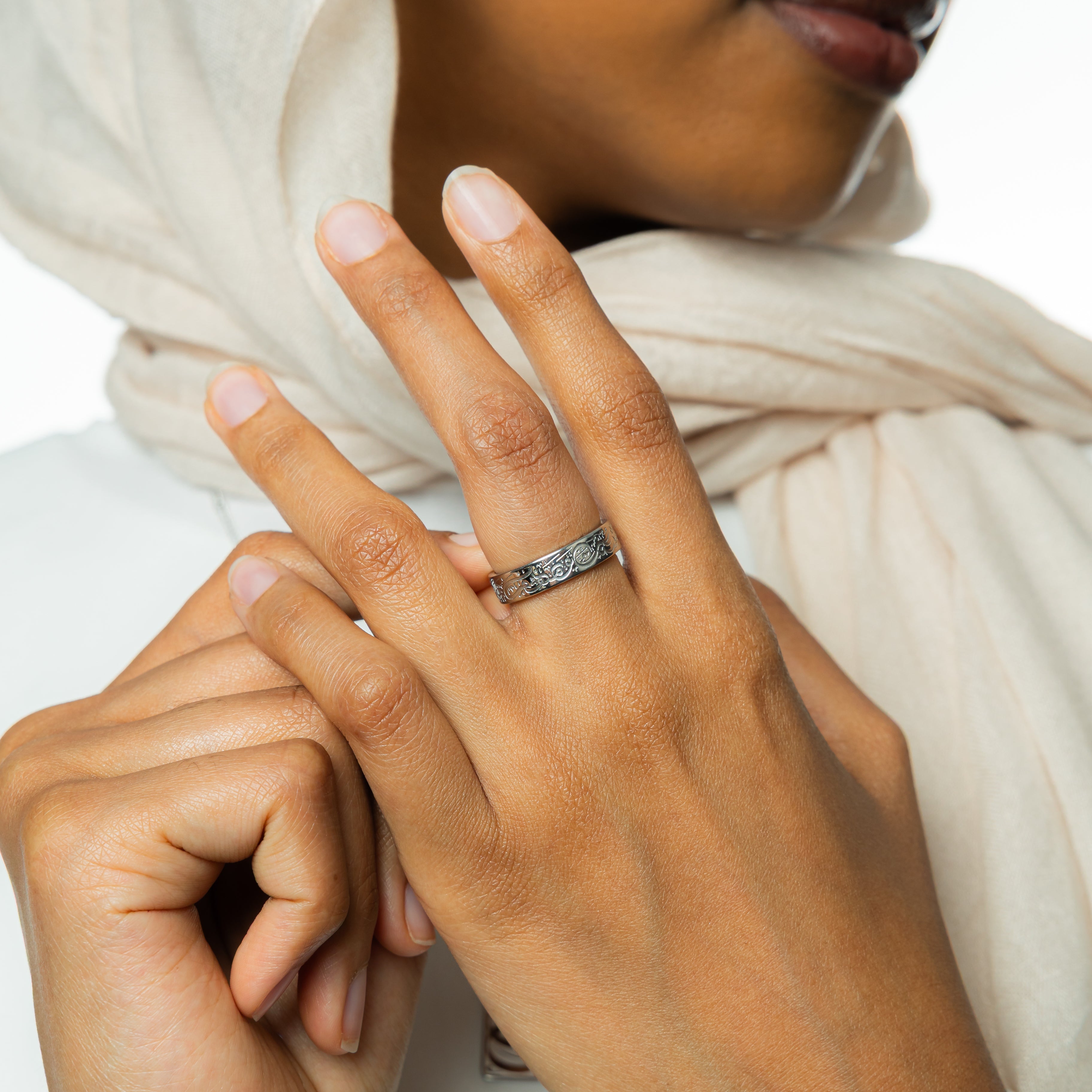 Rumi ring displayed in its velvet pouch, highlighting its beautiful packaging.