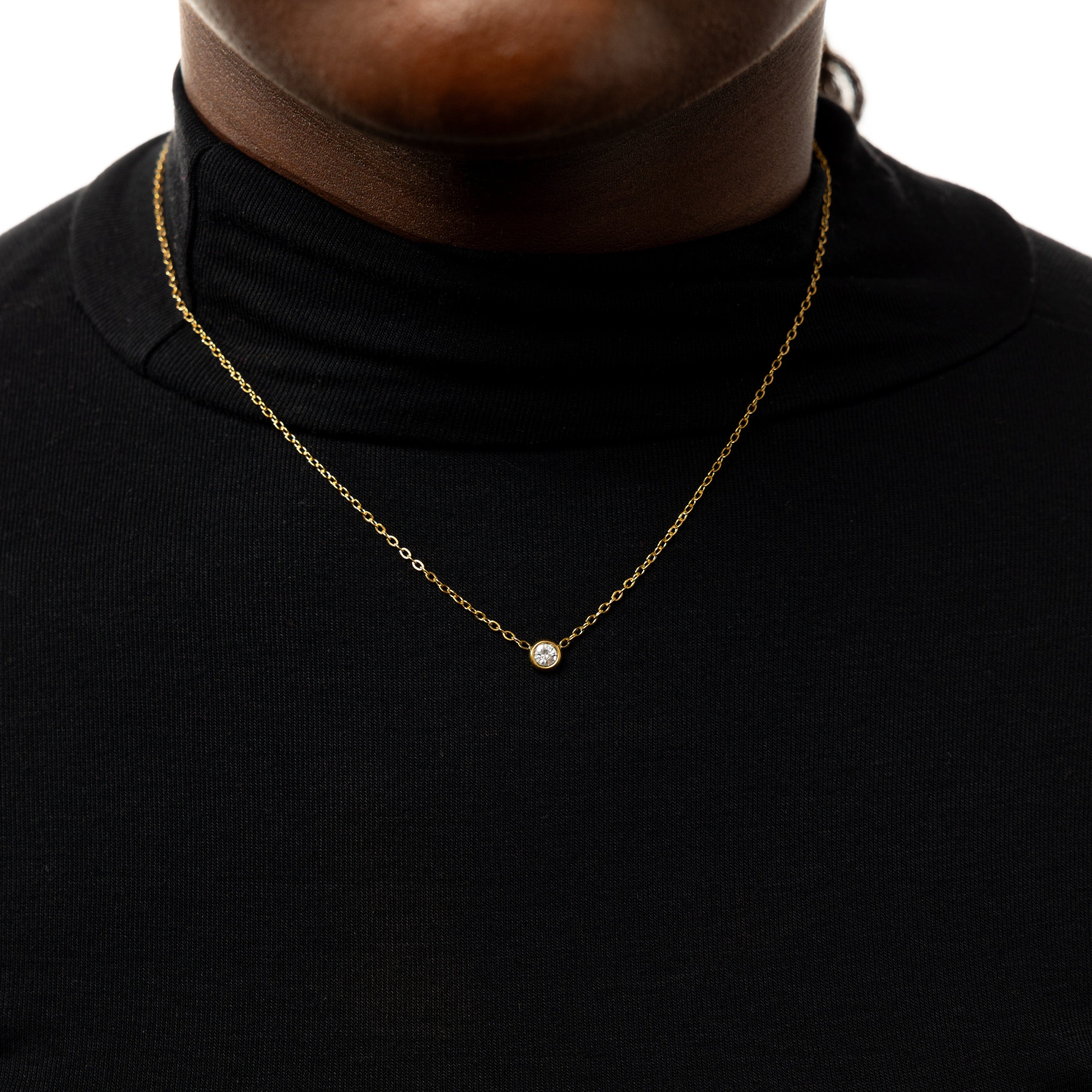 Necklace laid on a velvet pouch, demonstrating its luxurious packaging and premium quality.