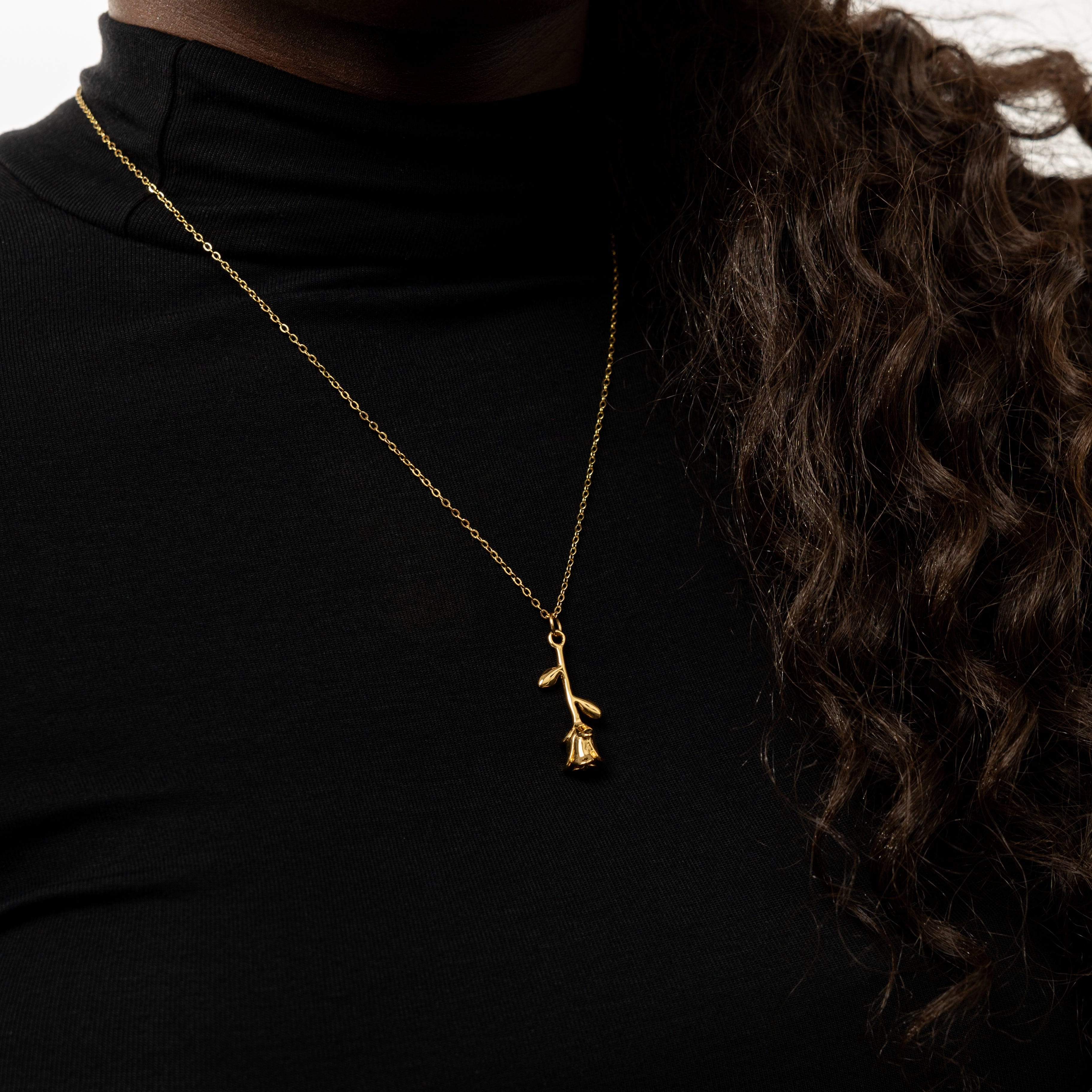 Close-up of the Blooming Elegance Gold Necklace, emphasizing its 25mm pendant and gold finish.