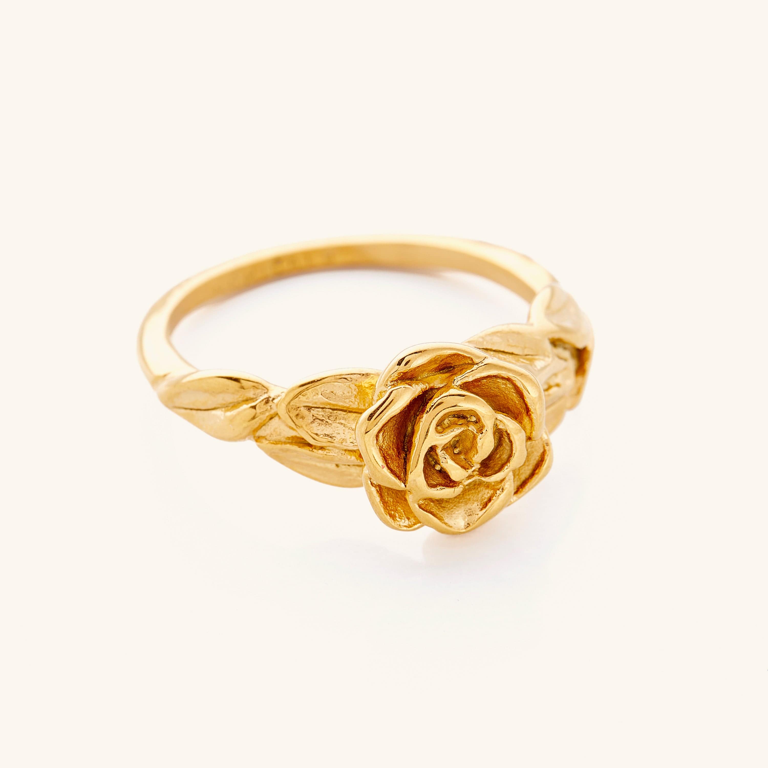 Close-up of the Eternal Bloom Hypoallergenic Ring highlighting its intricate rose design and gold finish.