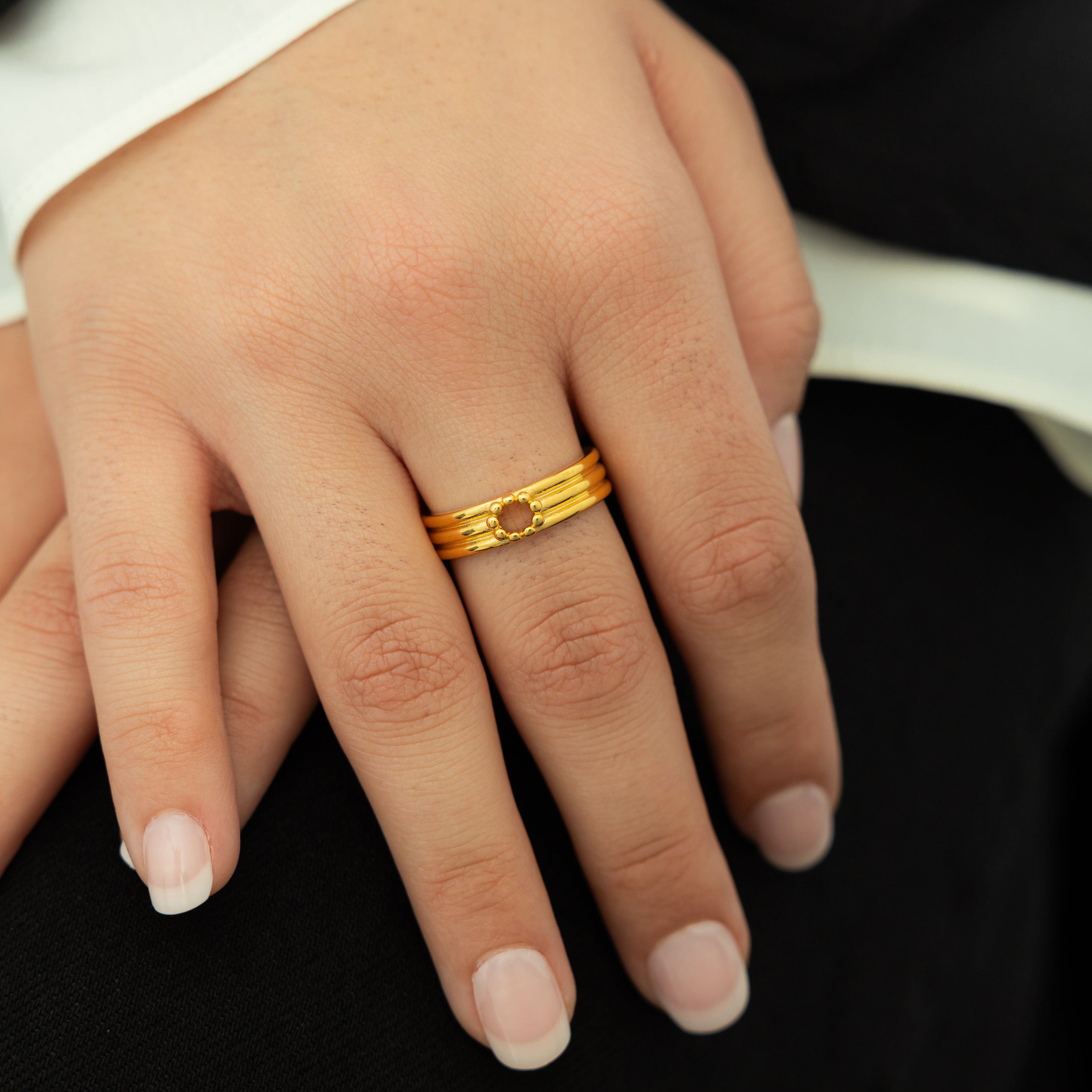 Model wearing the 18k gold plated waterproof ring, emphasizing its elegant style.