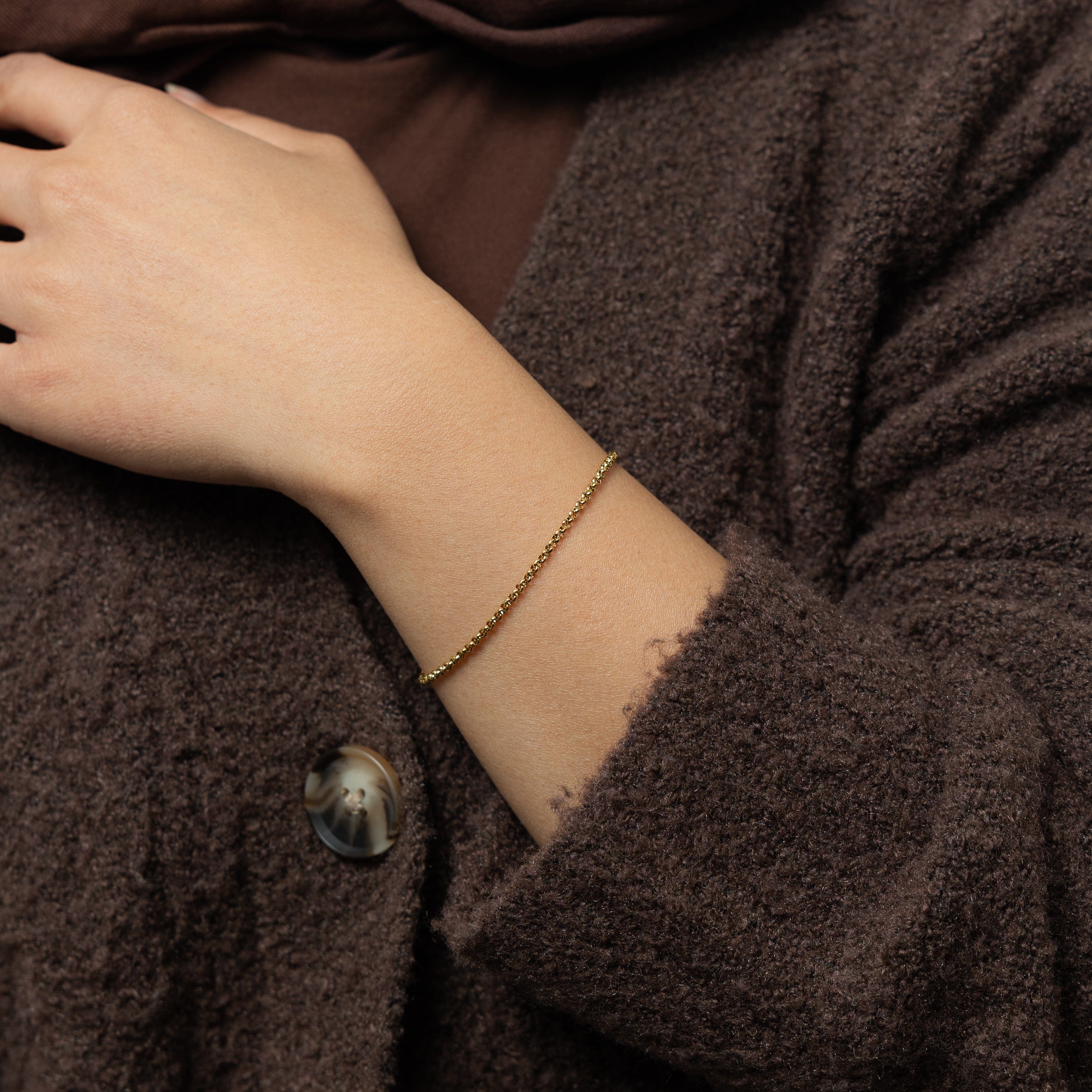 Elegant Invisible Box Bracelet worn on a wrist, demonstrating its stylish appearance and comfort for everyday wear.