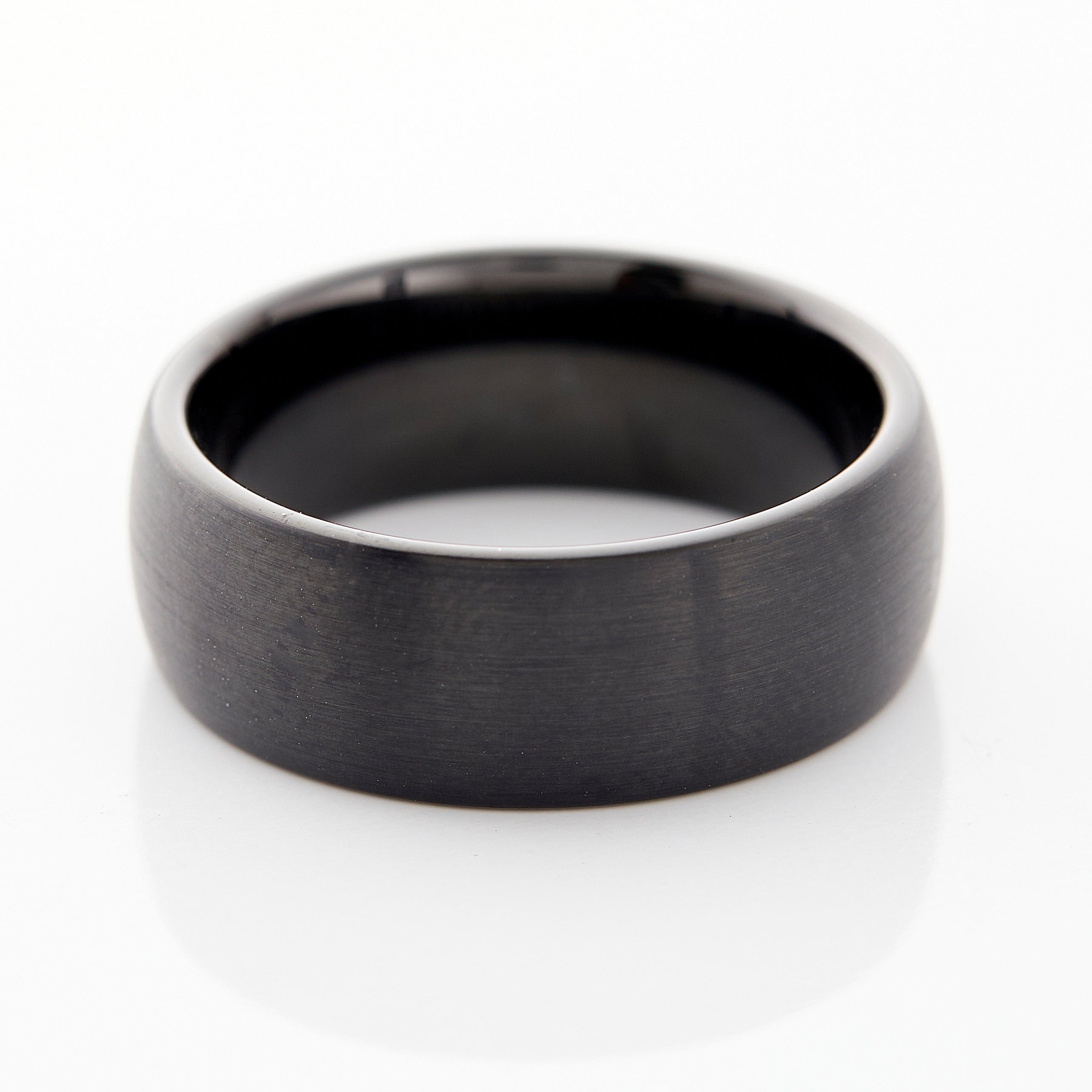 Close-up of the brushed tungsten band highlighting its smooth interior for comfort.