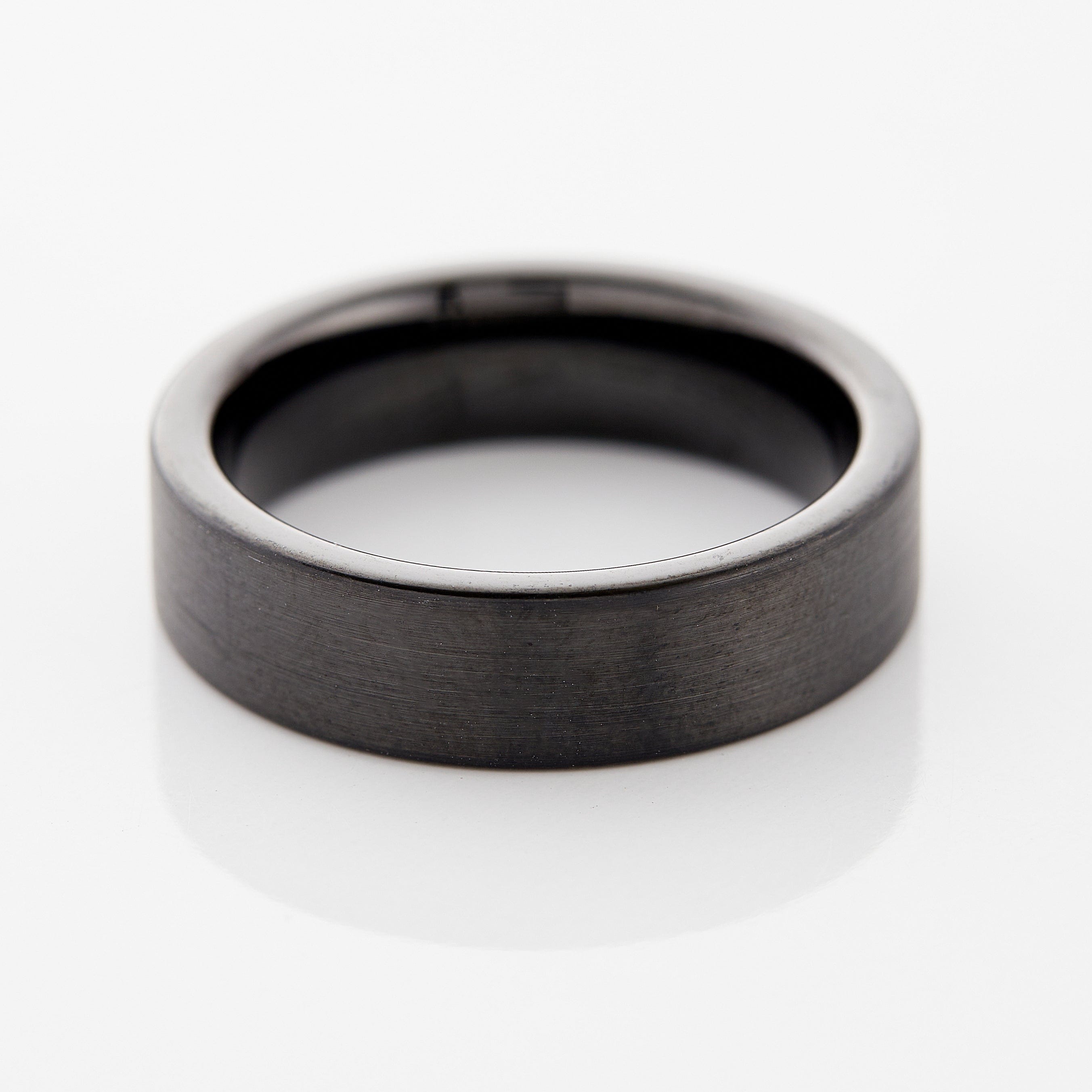 Different angles of the tungsten ring in both silver and black colors.