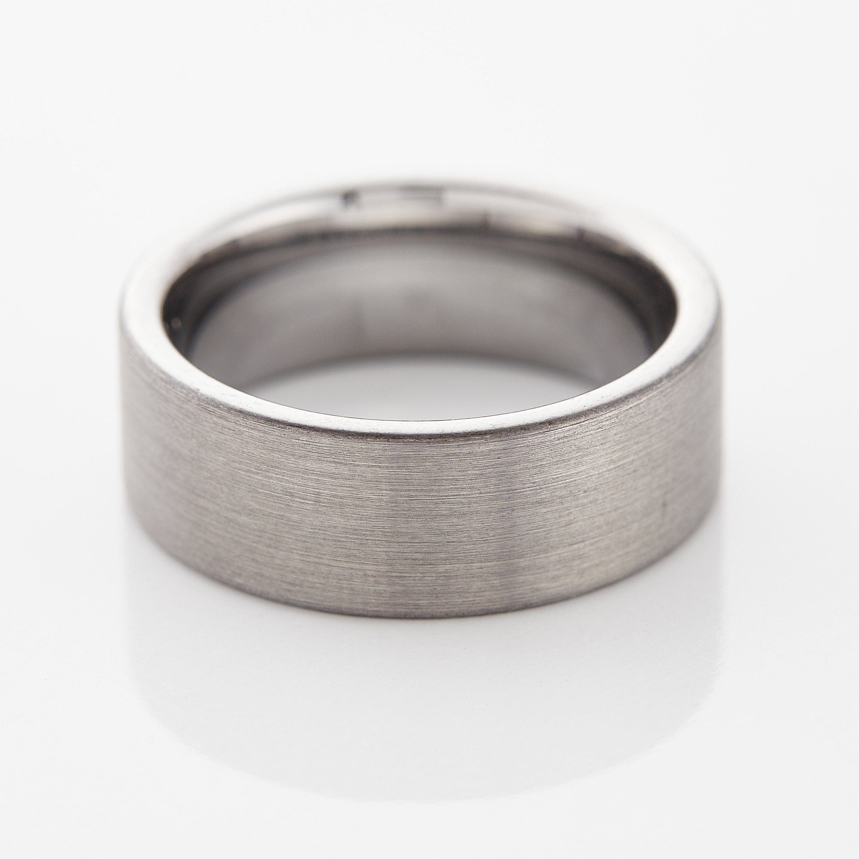 Different angles of the tungsten ring in both silver and black colors.