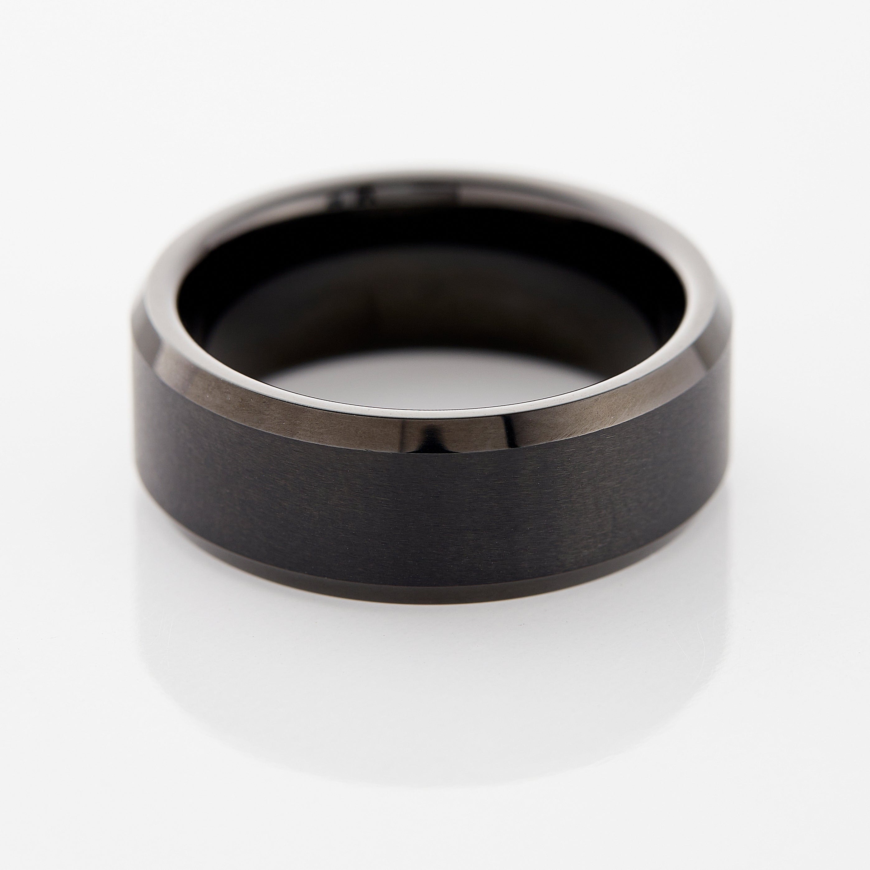 Close-up of Timeless Tungsten Mens Ring with brushed finish and glossy beveled edges.