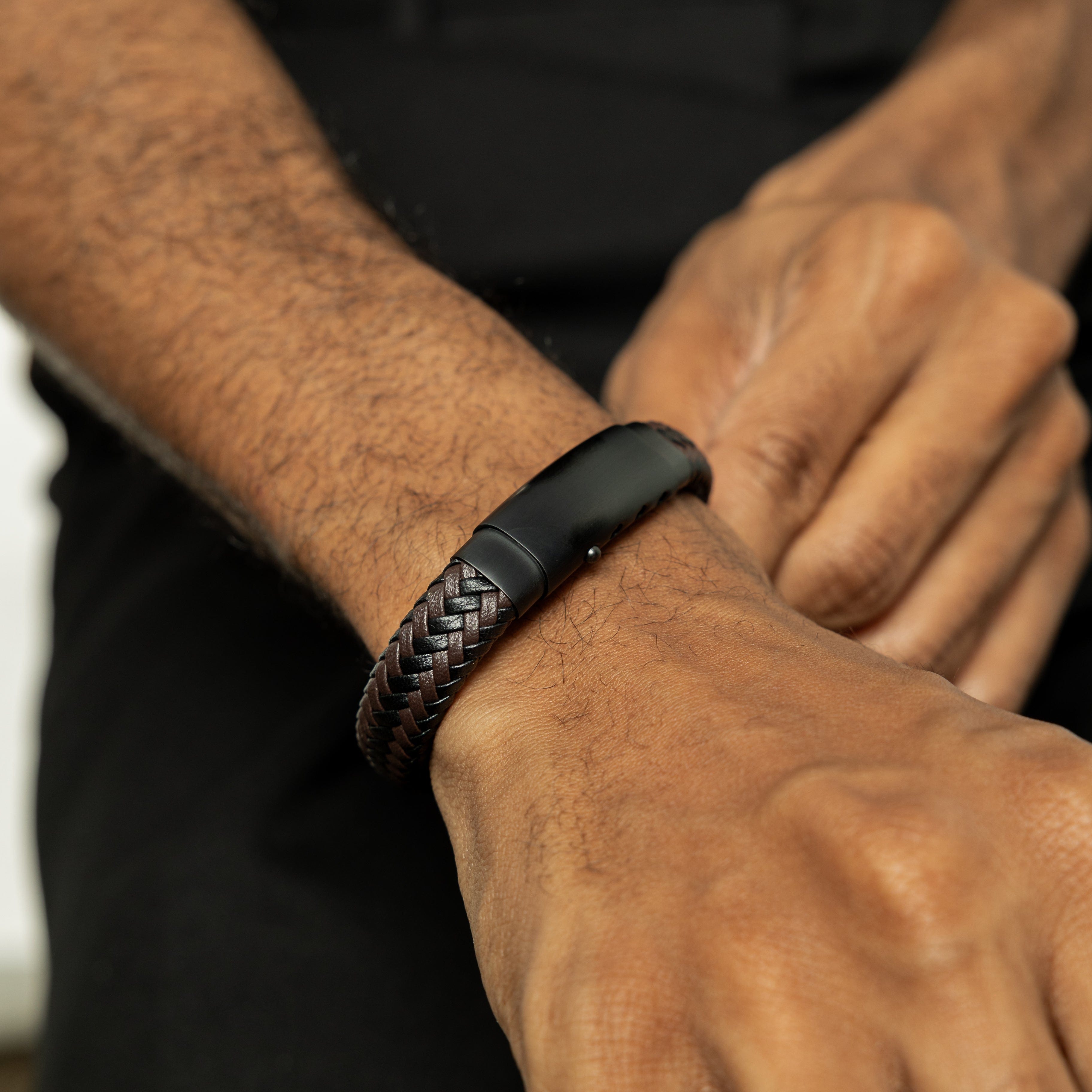 Timeless faux leather bracelet worn on a wrist, showing its stylish design and durability.