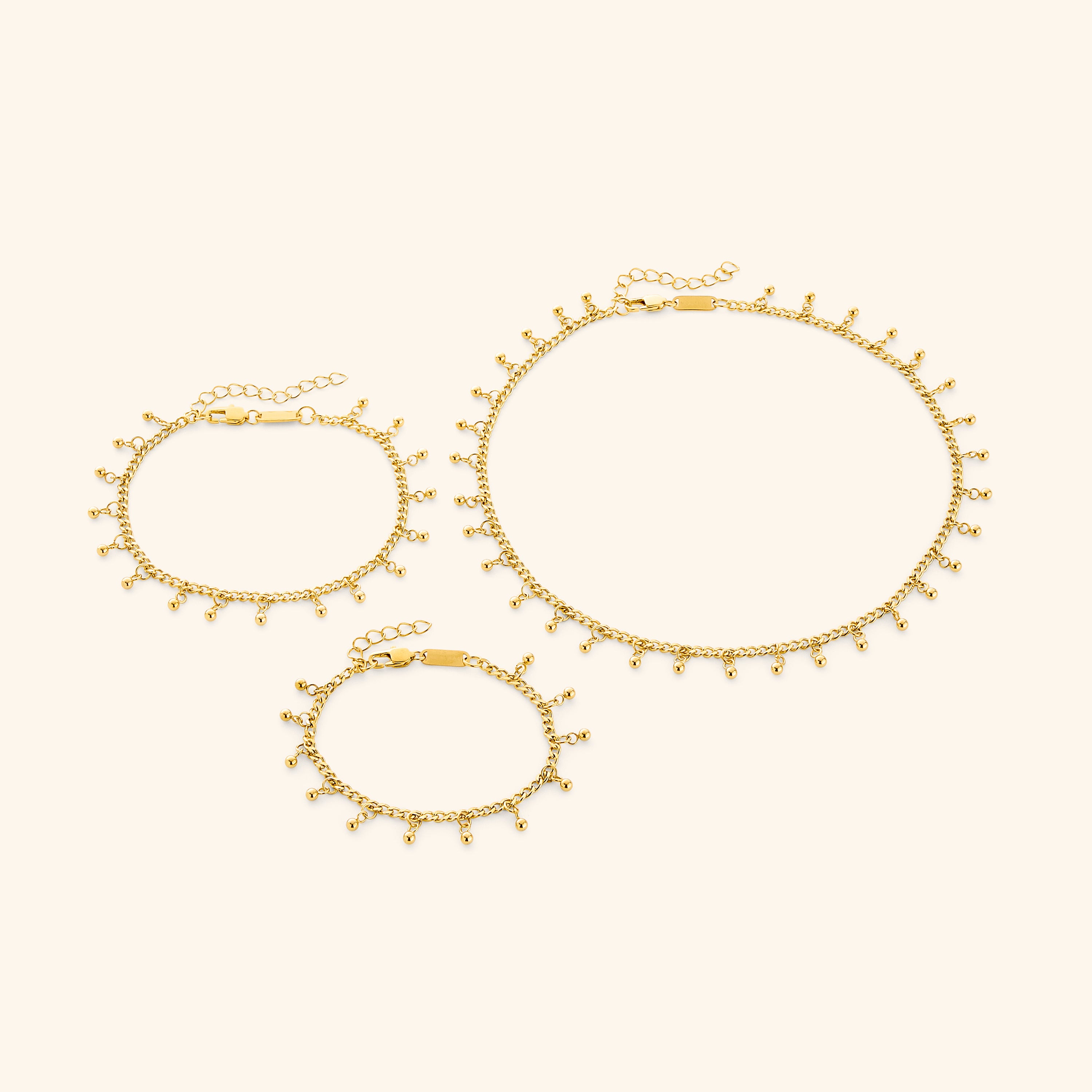 Charming Dots choker displayed elegantly with dangling charms.