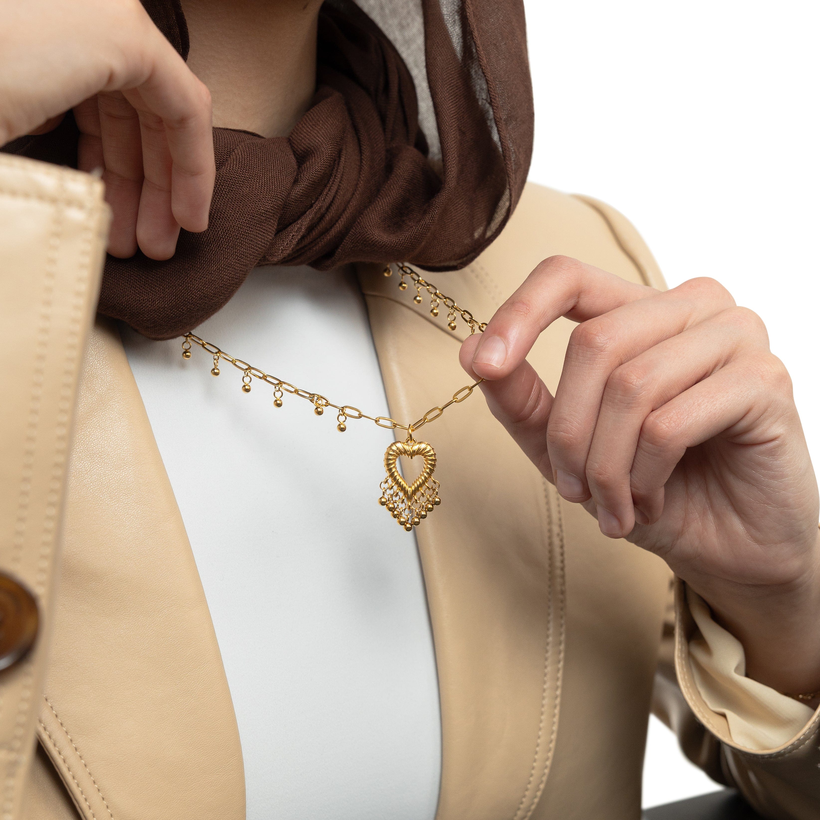 Model wearing the Ethereal Love Necklace, showcasing its elegance and movement.