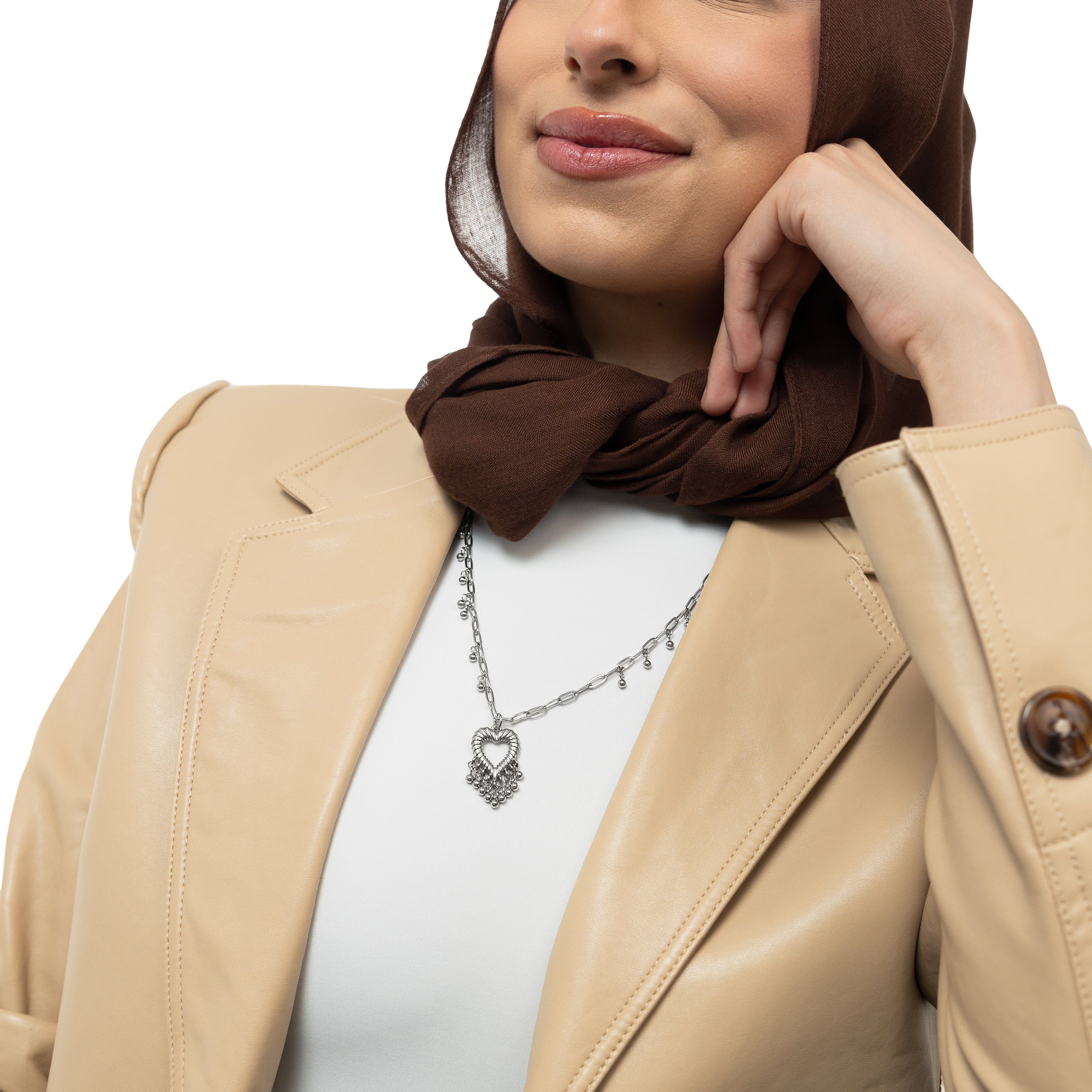 Close-up of the Ethereal Love Dangle Necklace highlighting the delicate gold orbs.