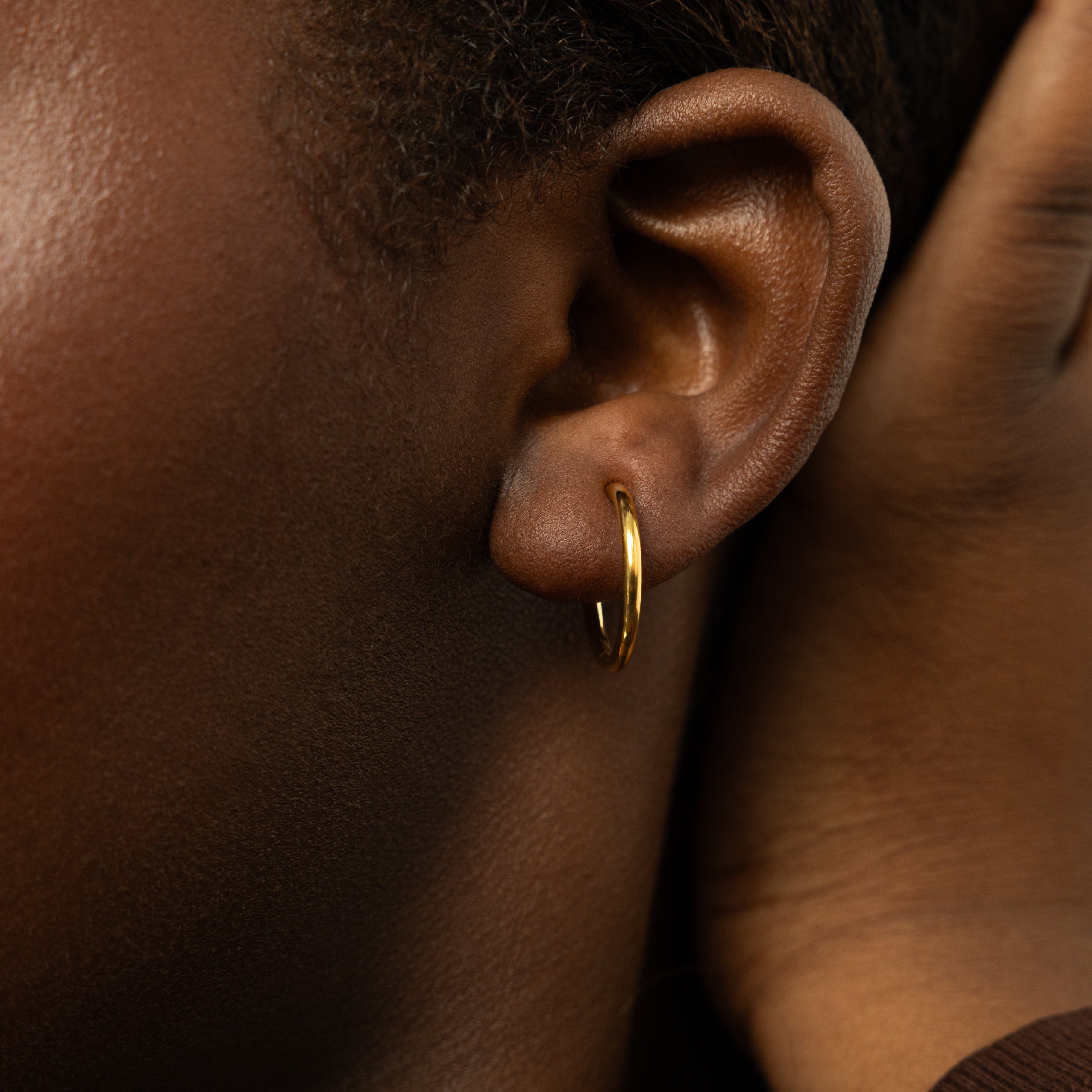 Lifestyle shot of women wearing trendy earring sets for women at a social event.