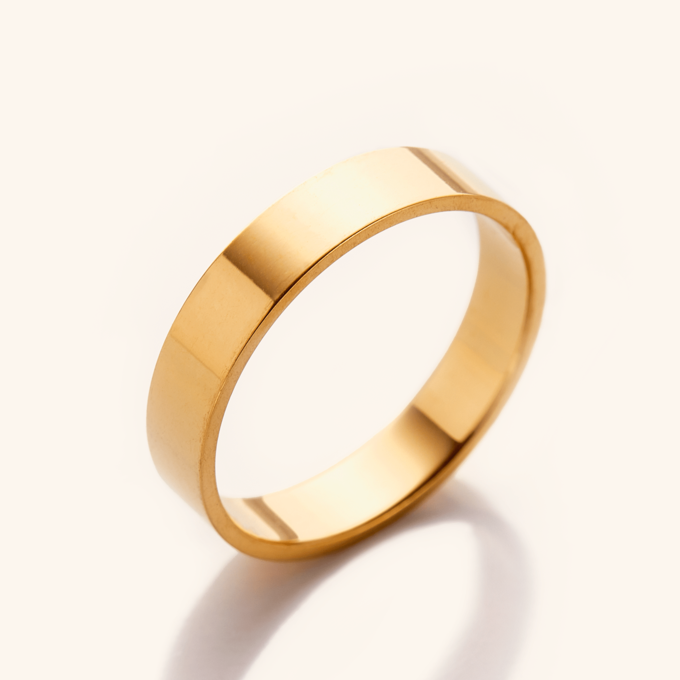 Radiant Stackable Gold Ring from the side, showcasing its sleek design.