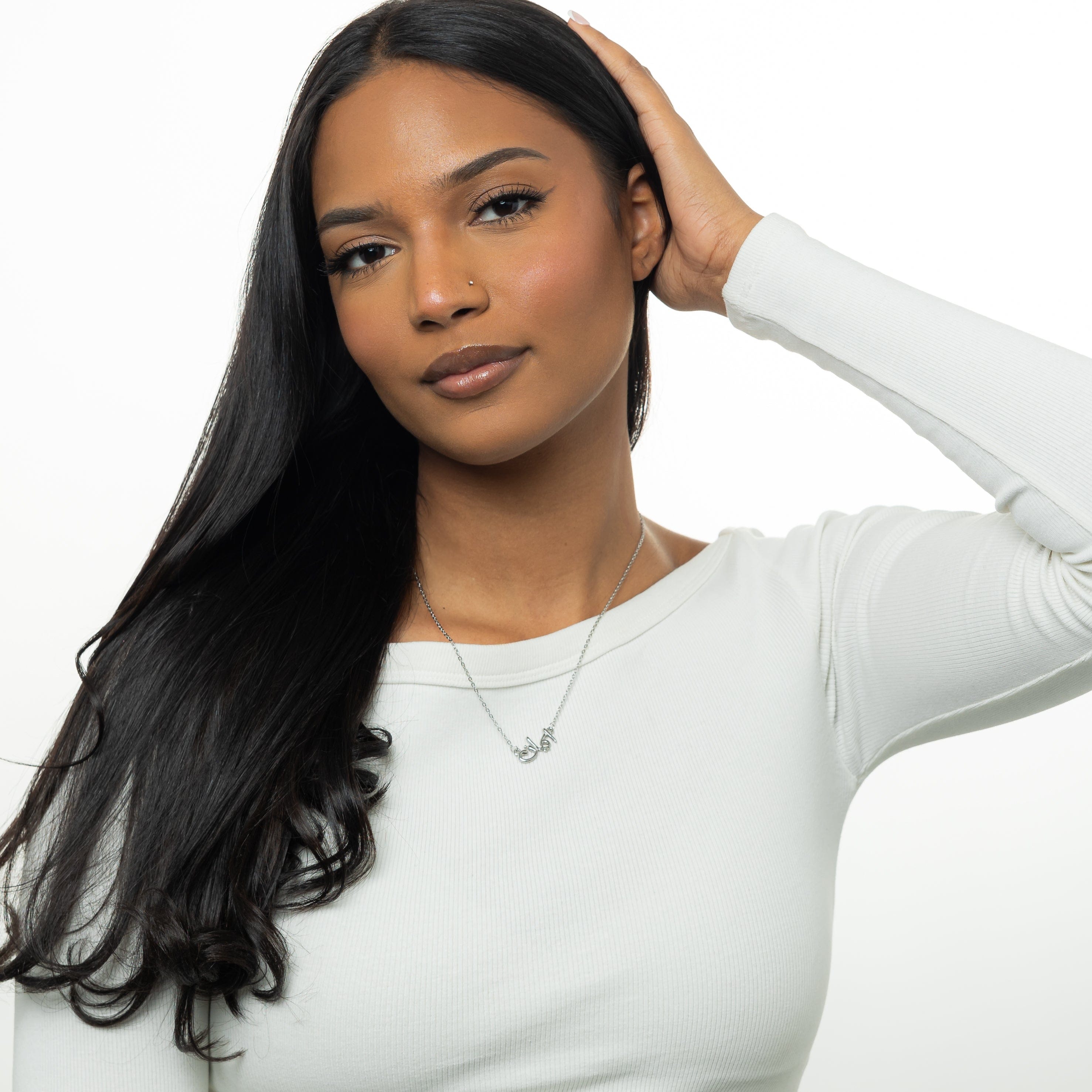 Faith bubble necklace displayed on a model, highlighting its elegant design and length.
