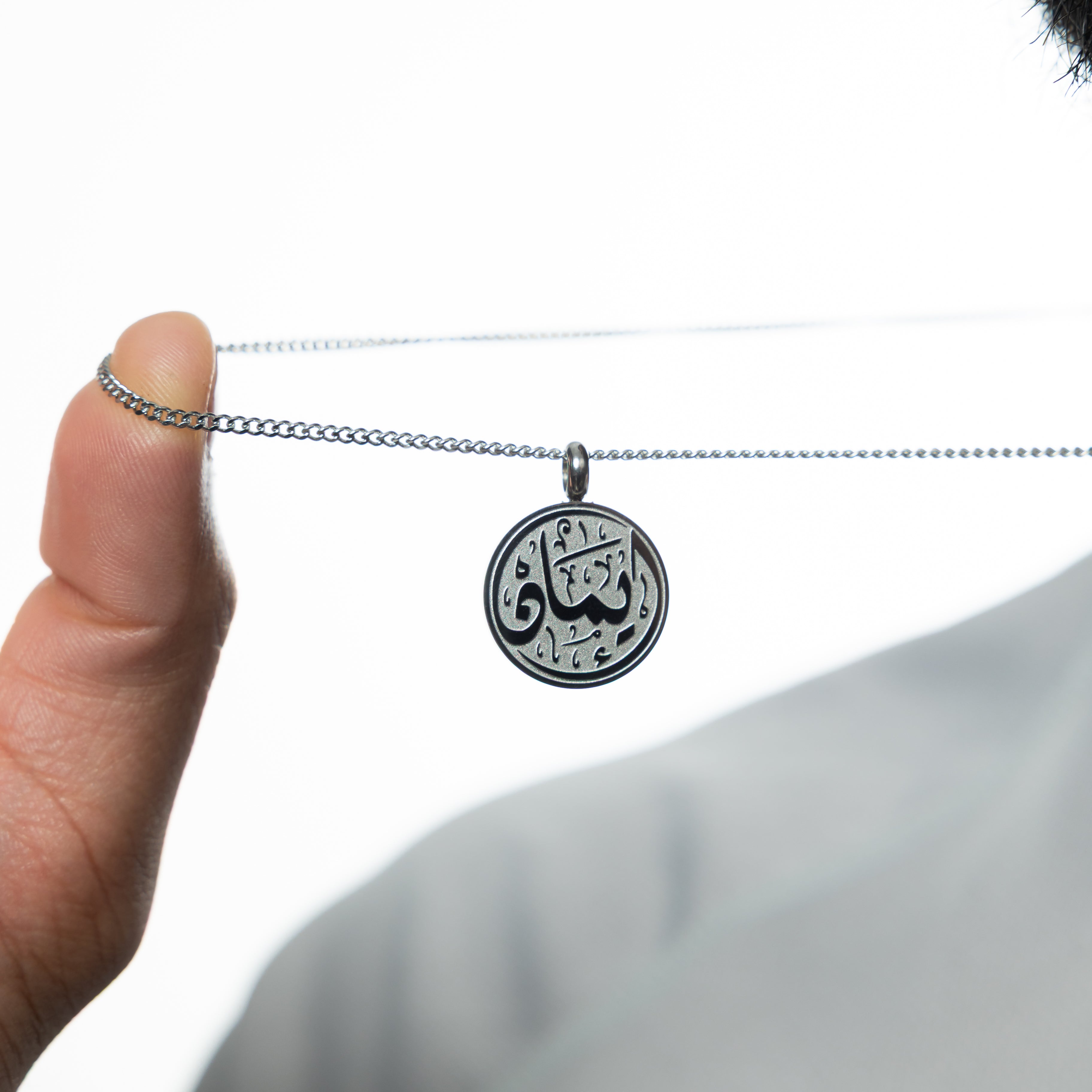 Packaging of the hypoallergenic mens necklace with a velvet pouch, perfect for gifting.