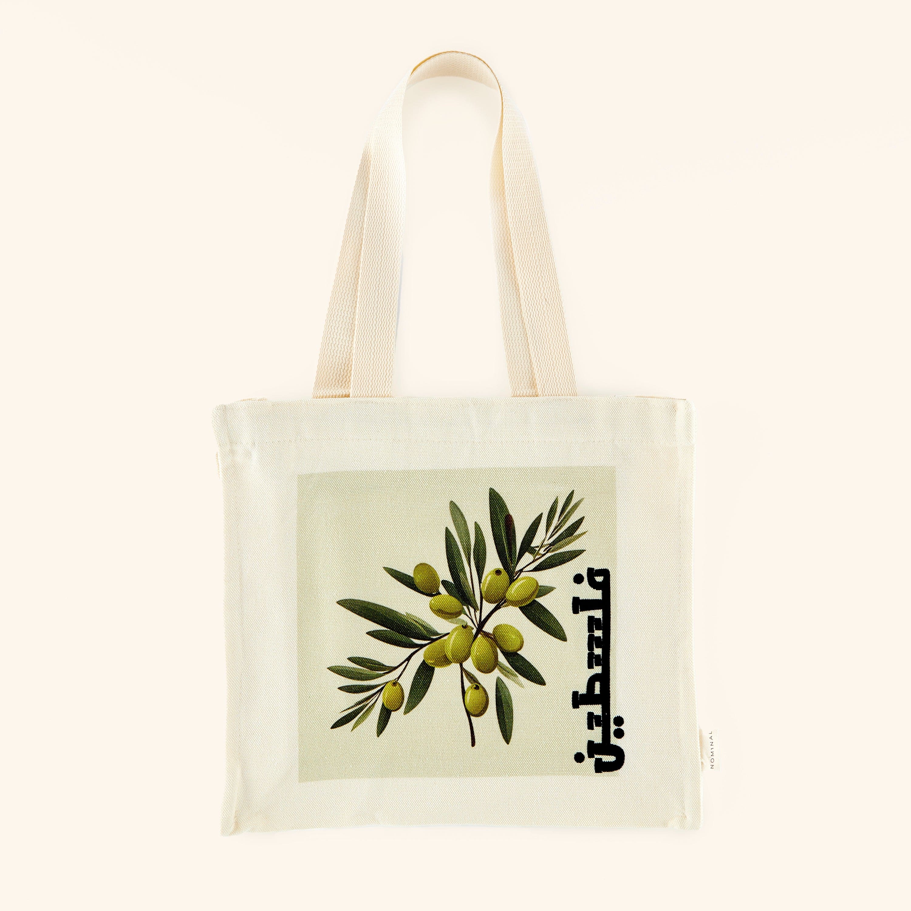 Front view of the Palestine olive branch canvas tote bag, showcasing the vibrant print.