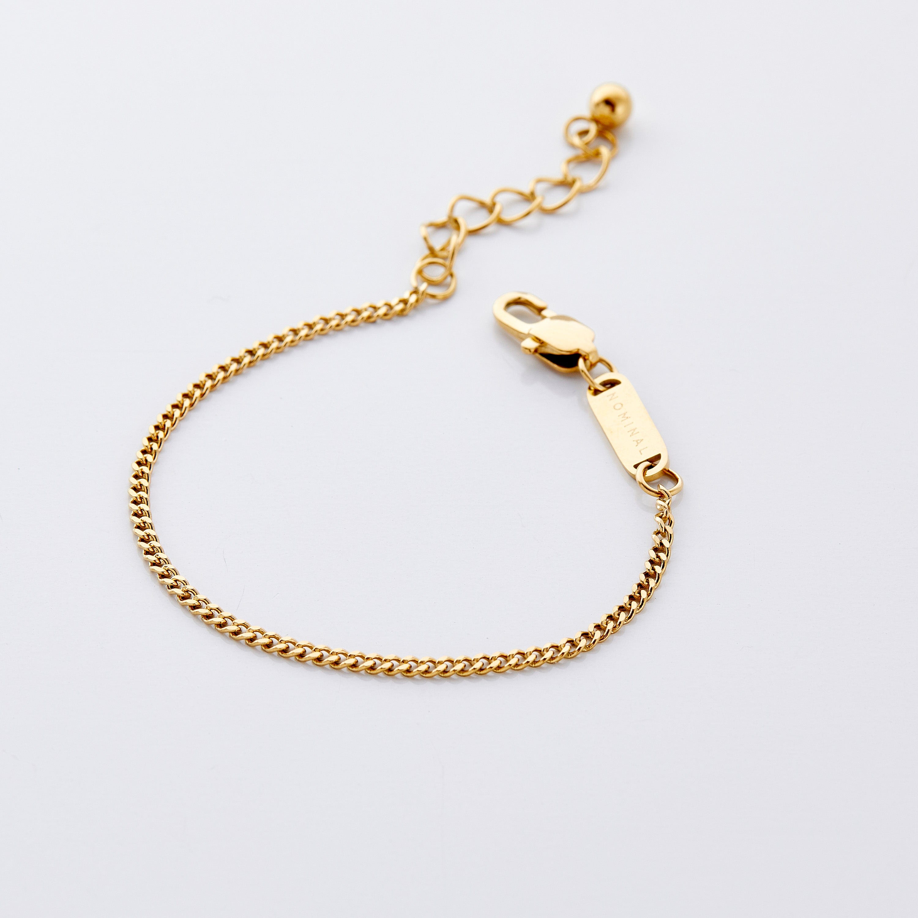 Close-up of the charming 18K gold plated Cuban chain bracelet for girls, showcasing its round uniform links.
