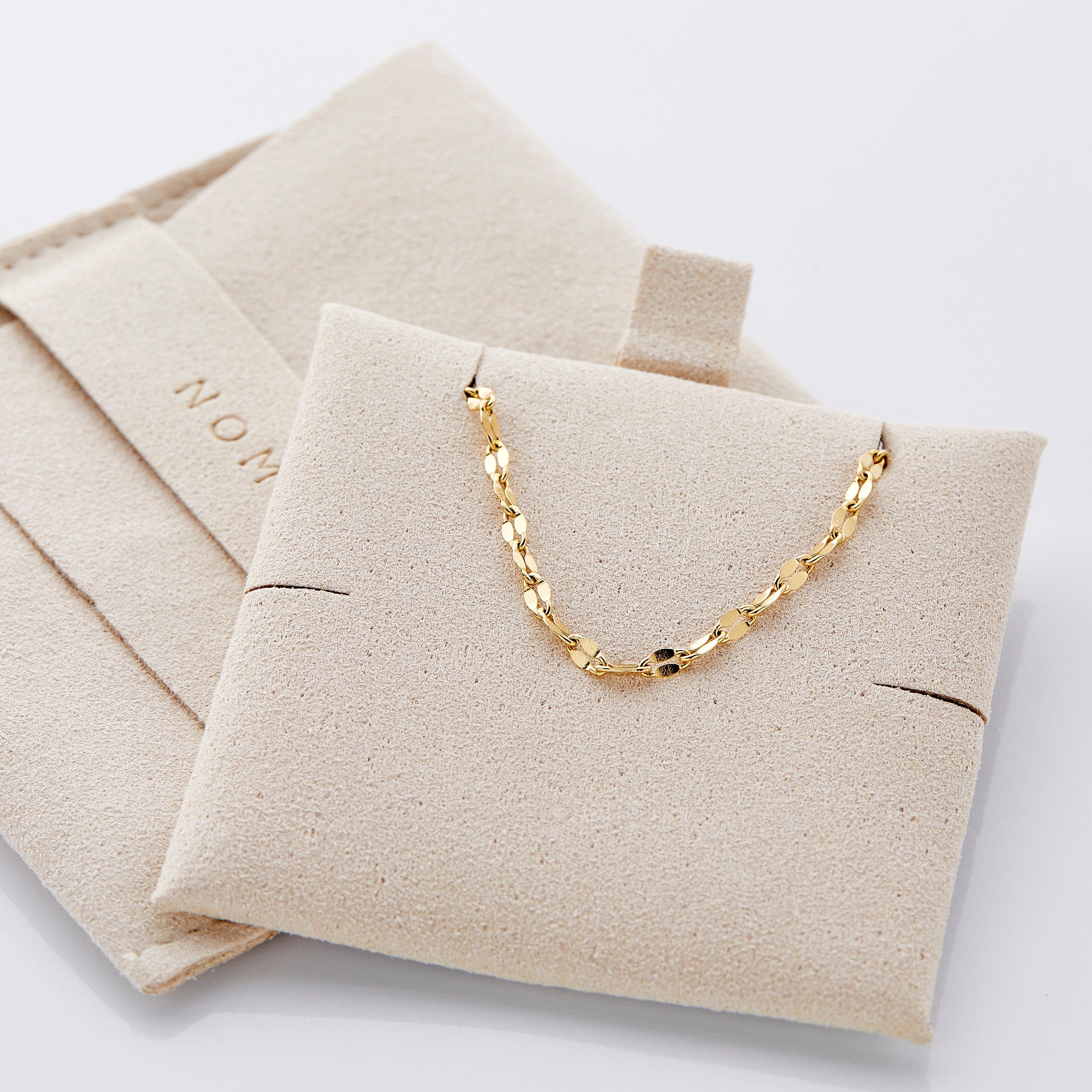A girl wearing the flutter chain bracelet in a casual setting, highlighting its versatility.