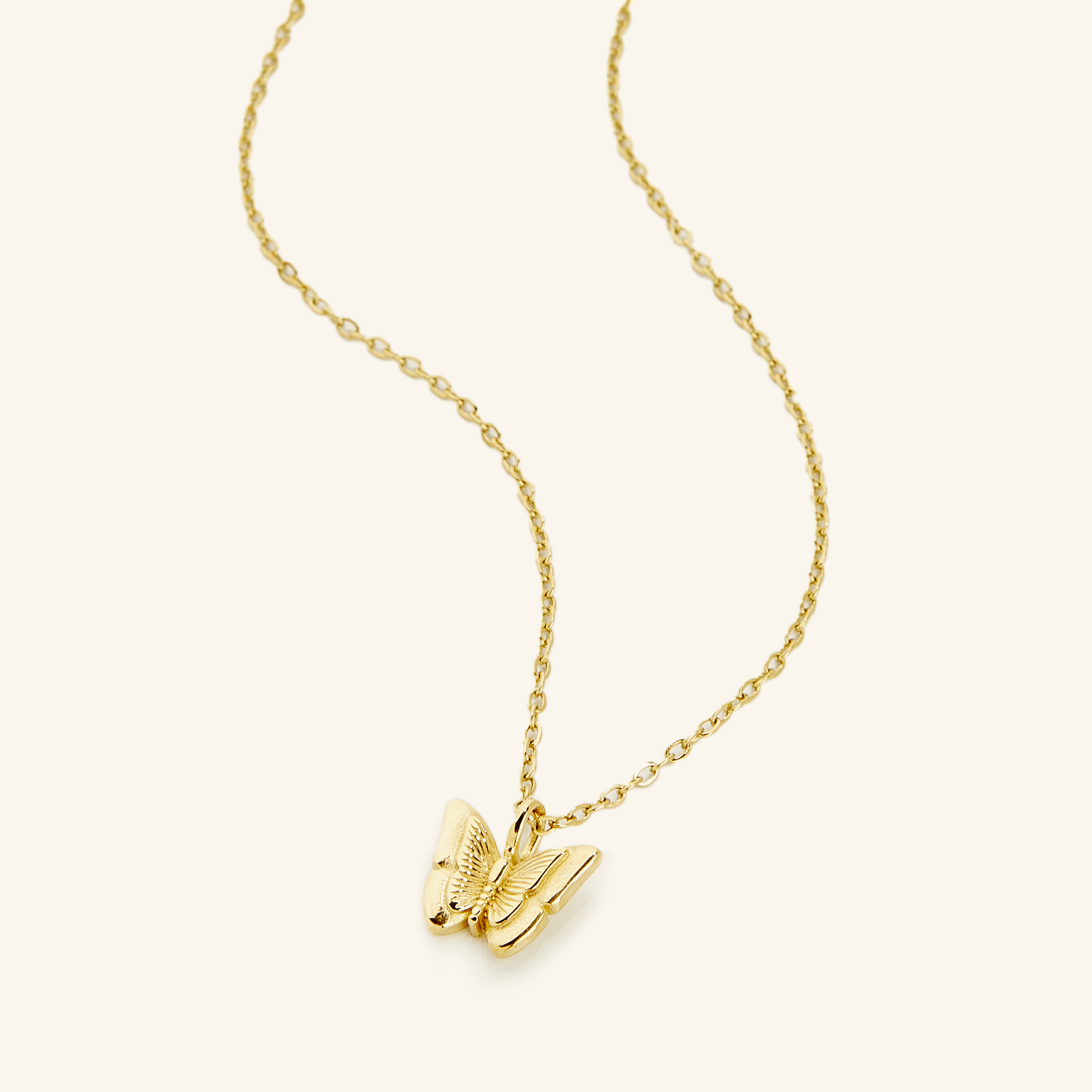 Close-up of the enchanting butterfly necklace for girls, showcasing its intricate design.