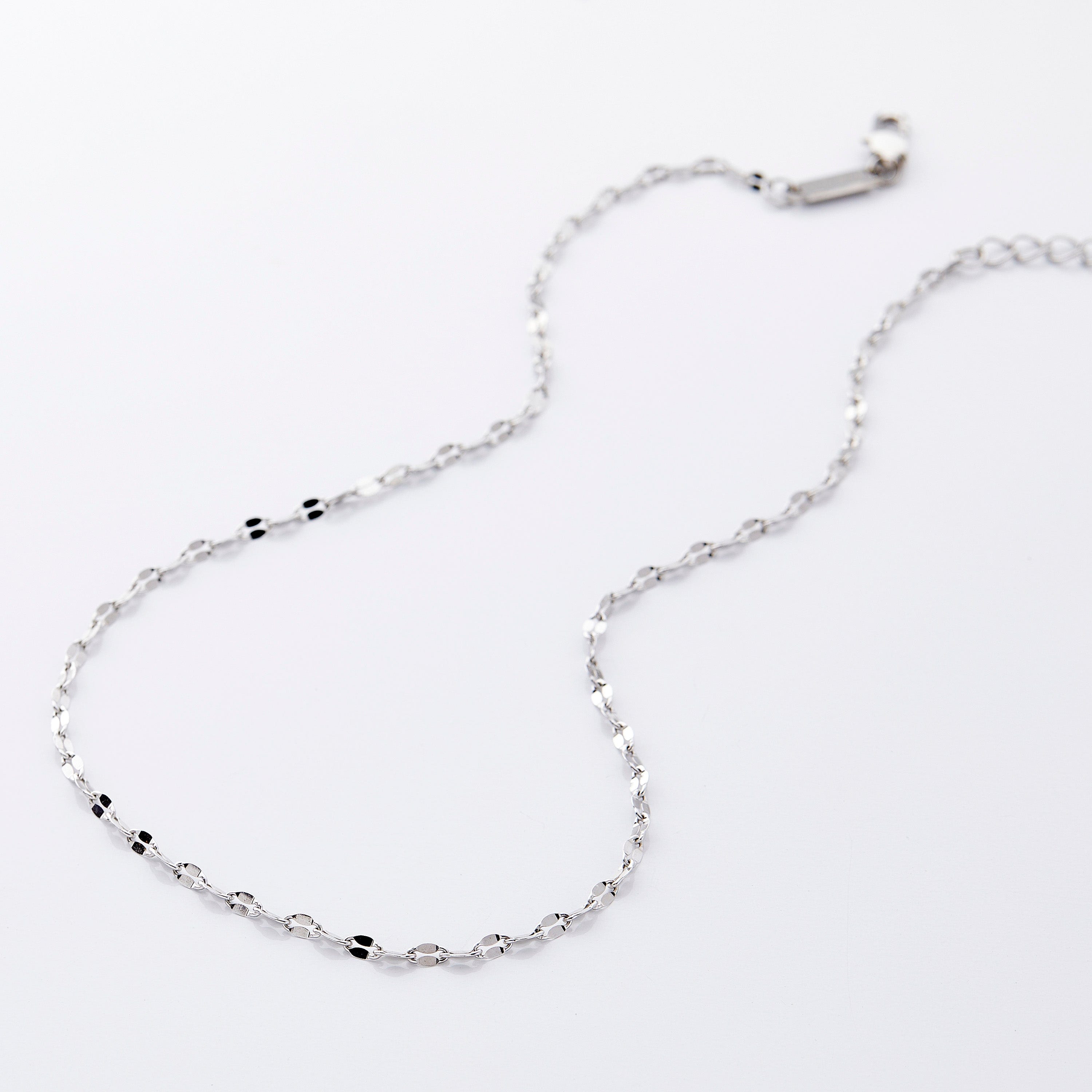 Close-up of the waterproof gold necklace showcasing its intricate design.