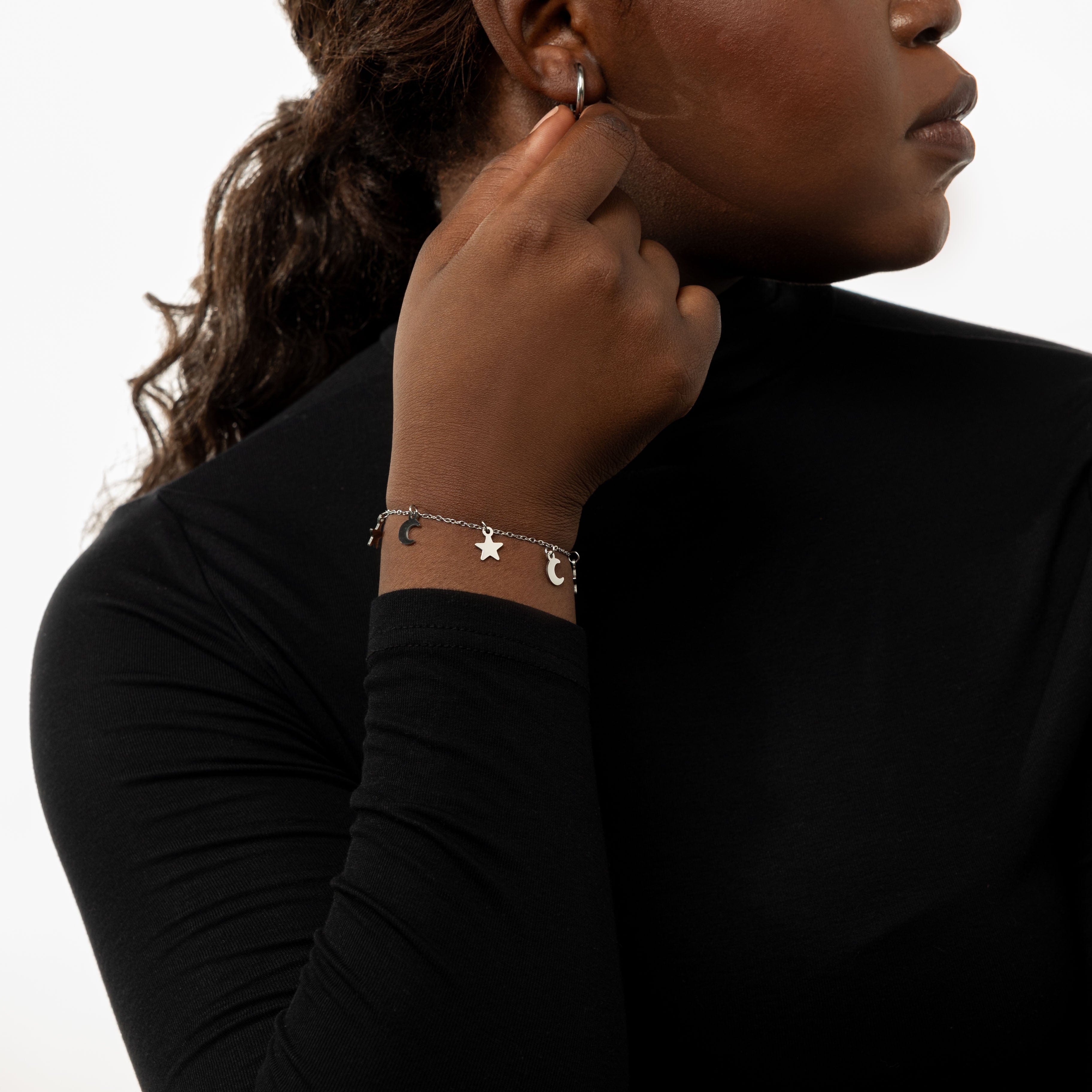 Celestial Elegance Gold Bracelet on a velvet pouch, highlighting its shine and elegance.