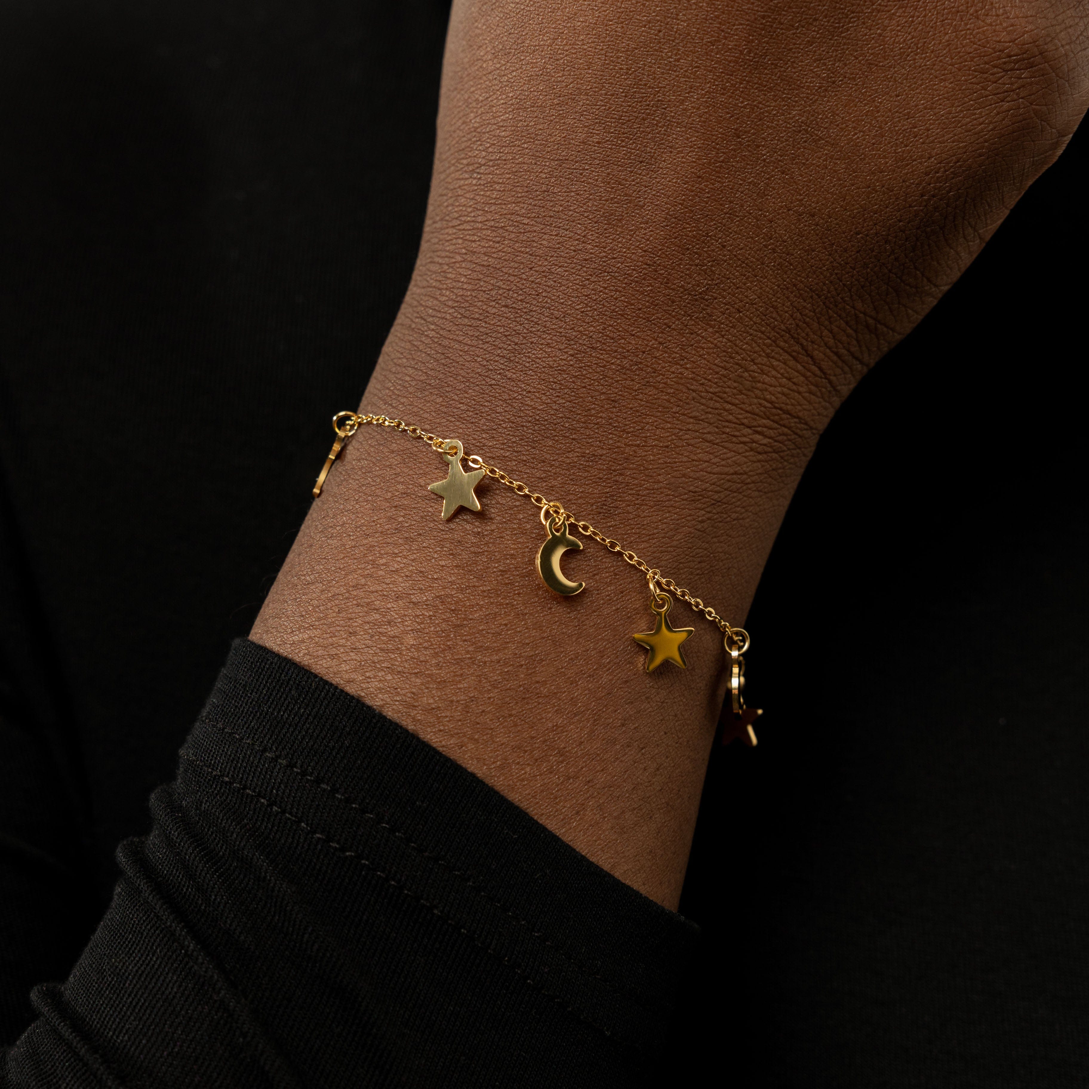 Close-up view of the gold bracelet, showing intricate details and hypoallergenic features.