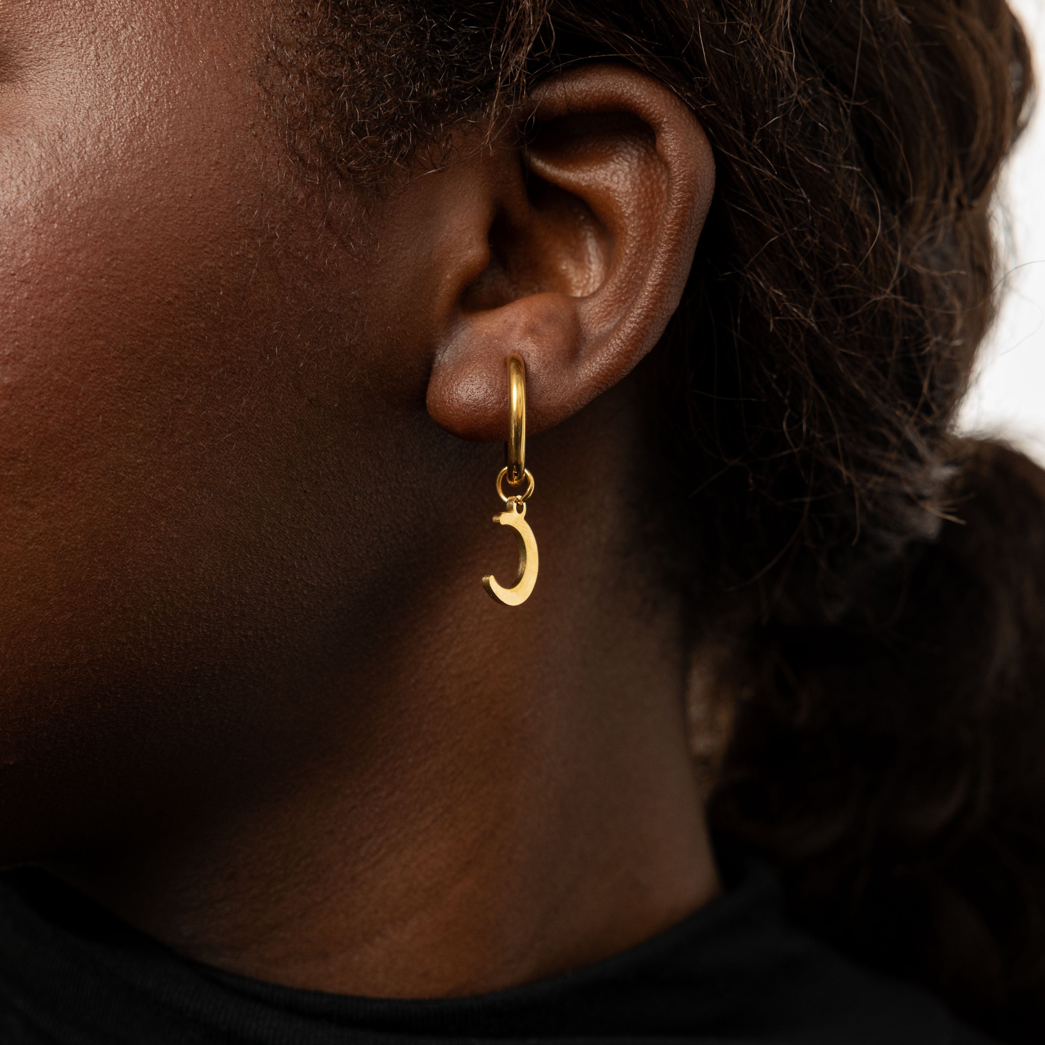 Celestial Gold Hoop Earrings displayed in a velvet pouch, perfect for gifts