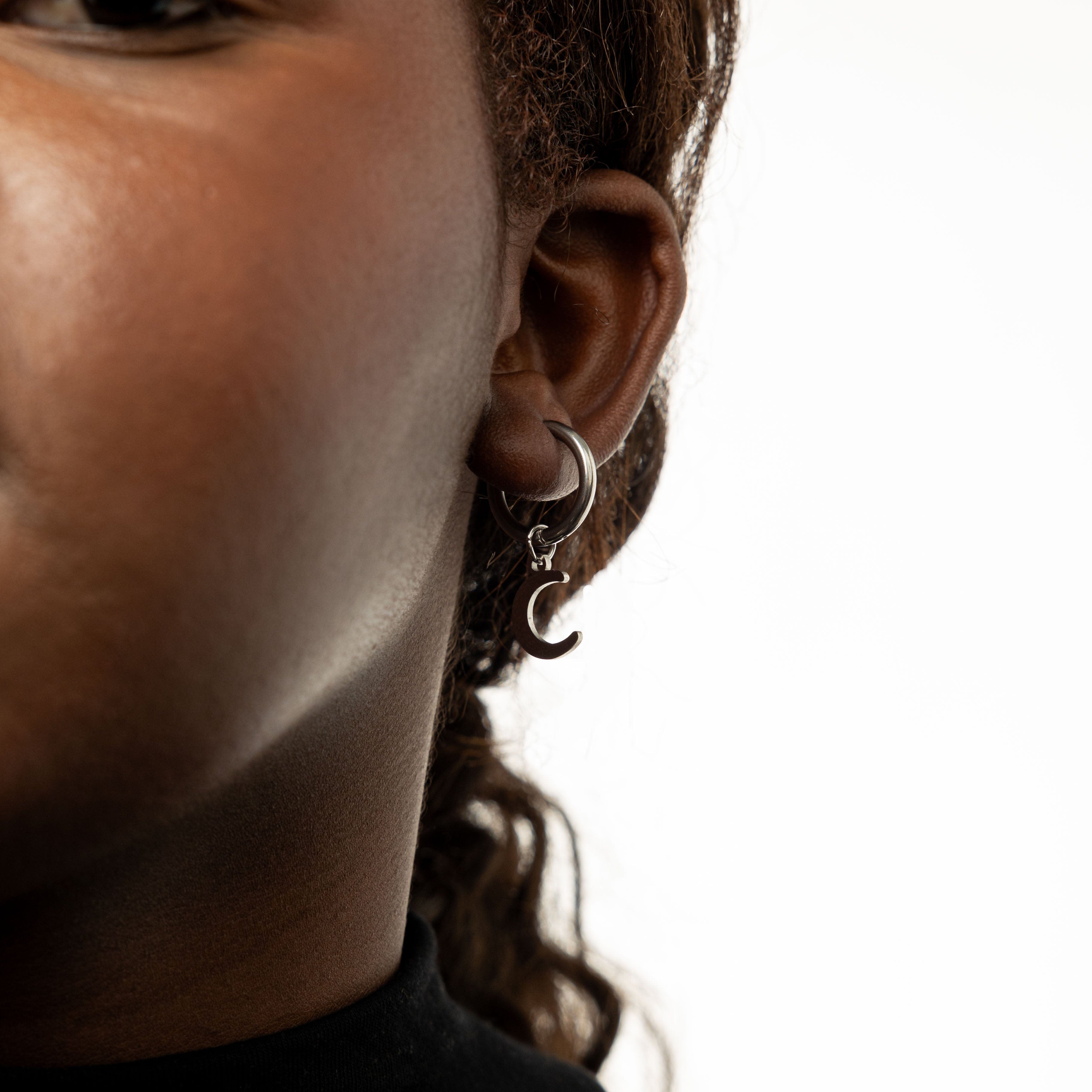 Front view of Celestial Gold Hoop Earrings showcasing their elegant design