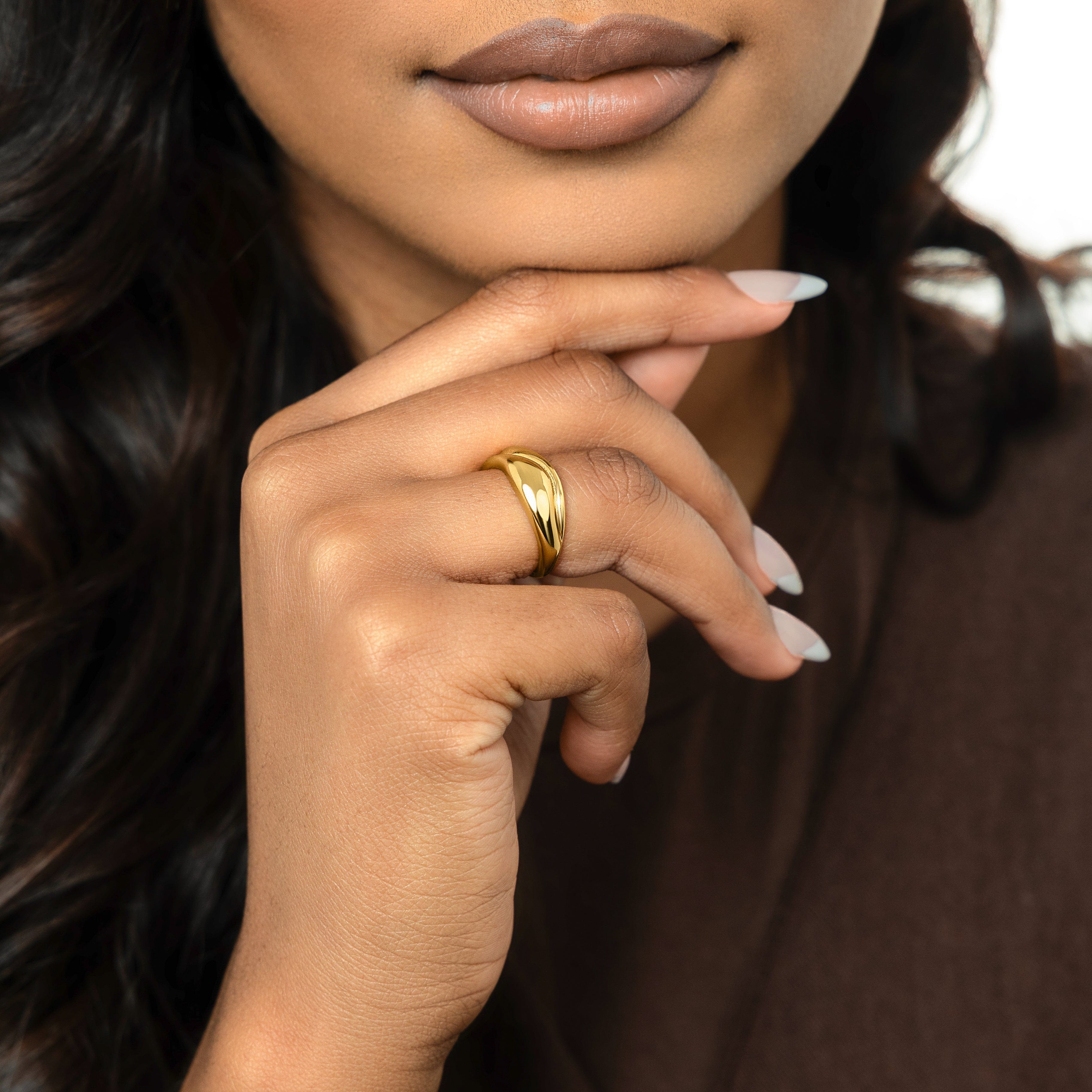 Fluid Harmony Stackable Ring displayed elegantly on a finger, showcasing its dainty design.