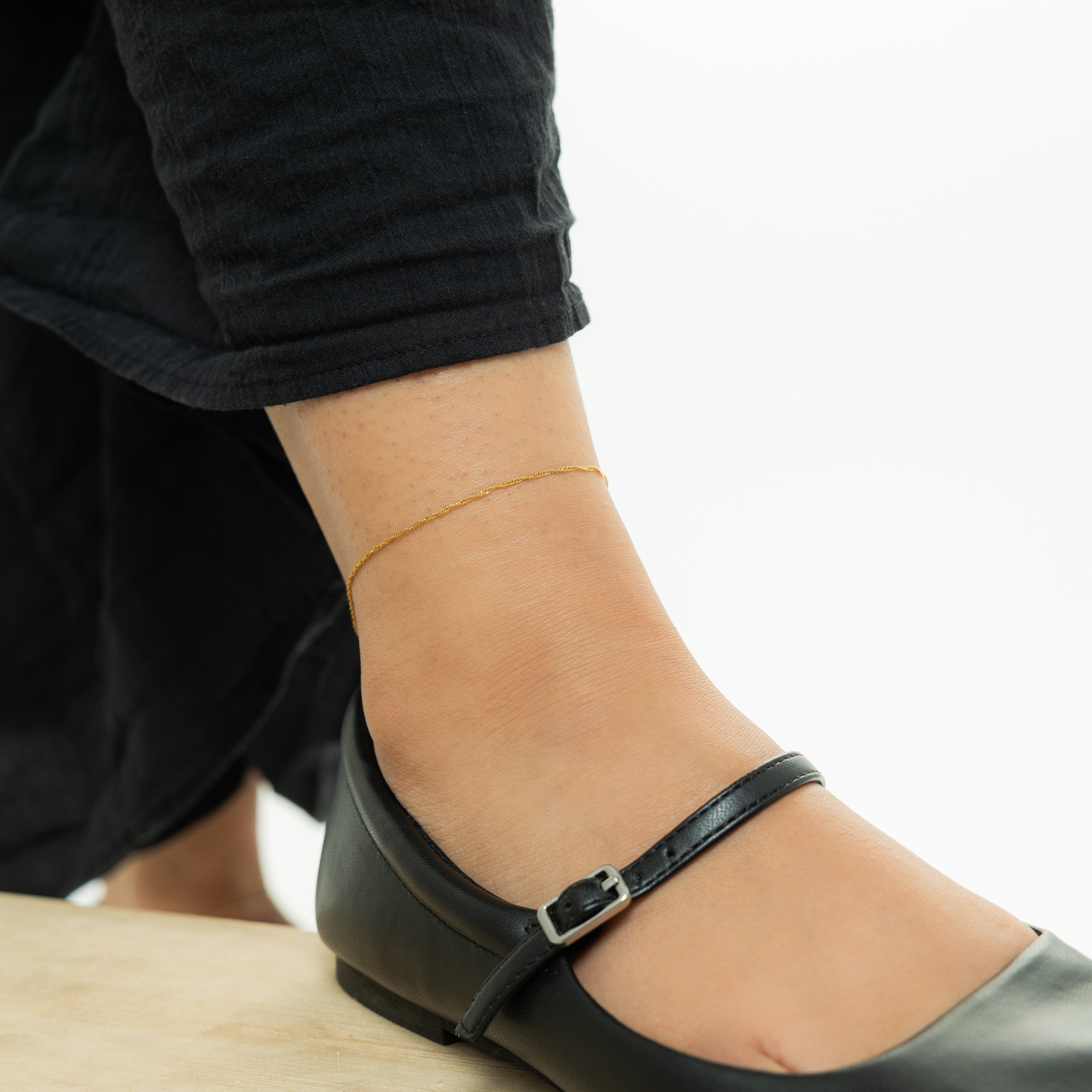 Detail shot of the anklet showing 1MM twirling chain and extender clasp