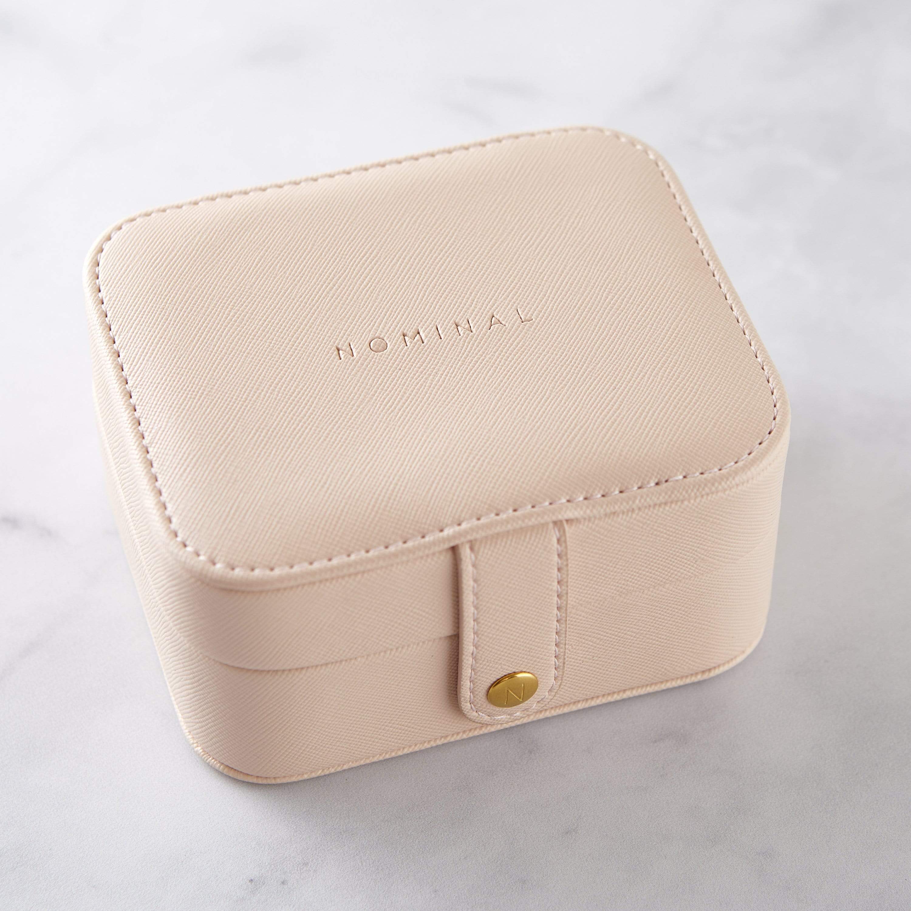 The Journey Travel Jewelry Case opened, displaying three sections for organized accessory storage.
