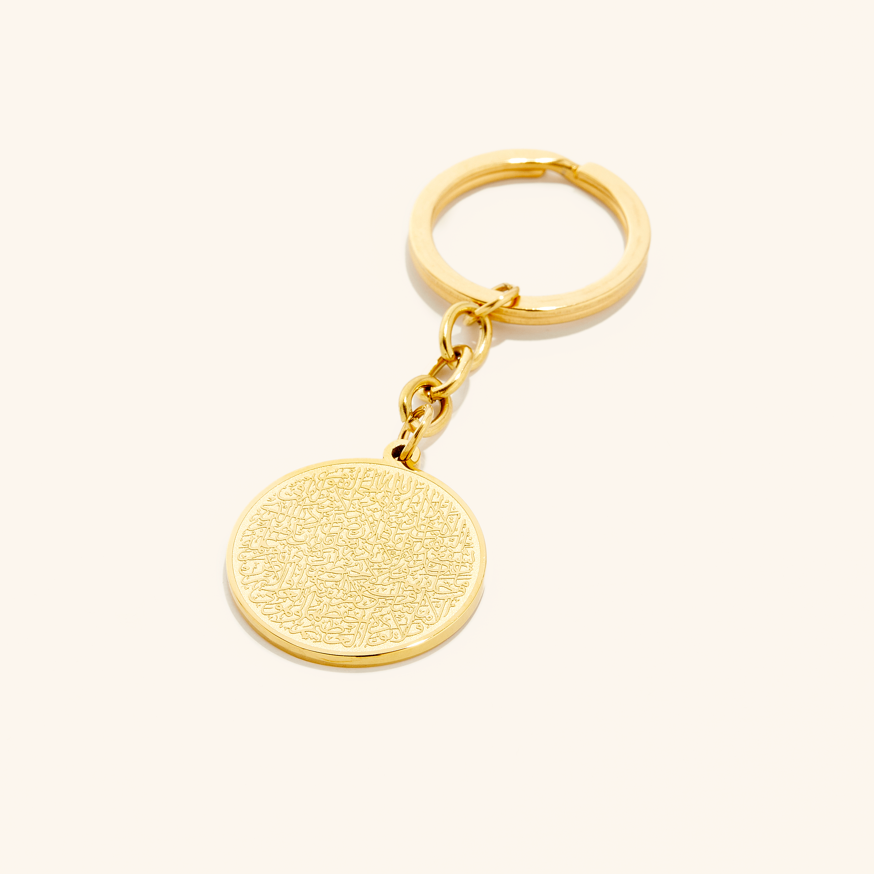 Elegant Ayatul Kursi keychain showcasing intricate calligraphy art from Syria.