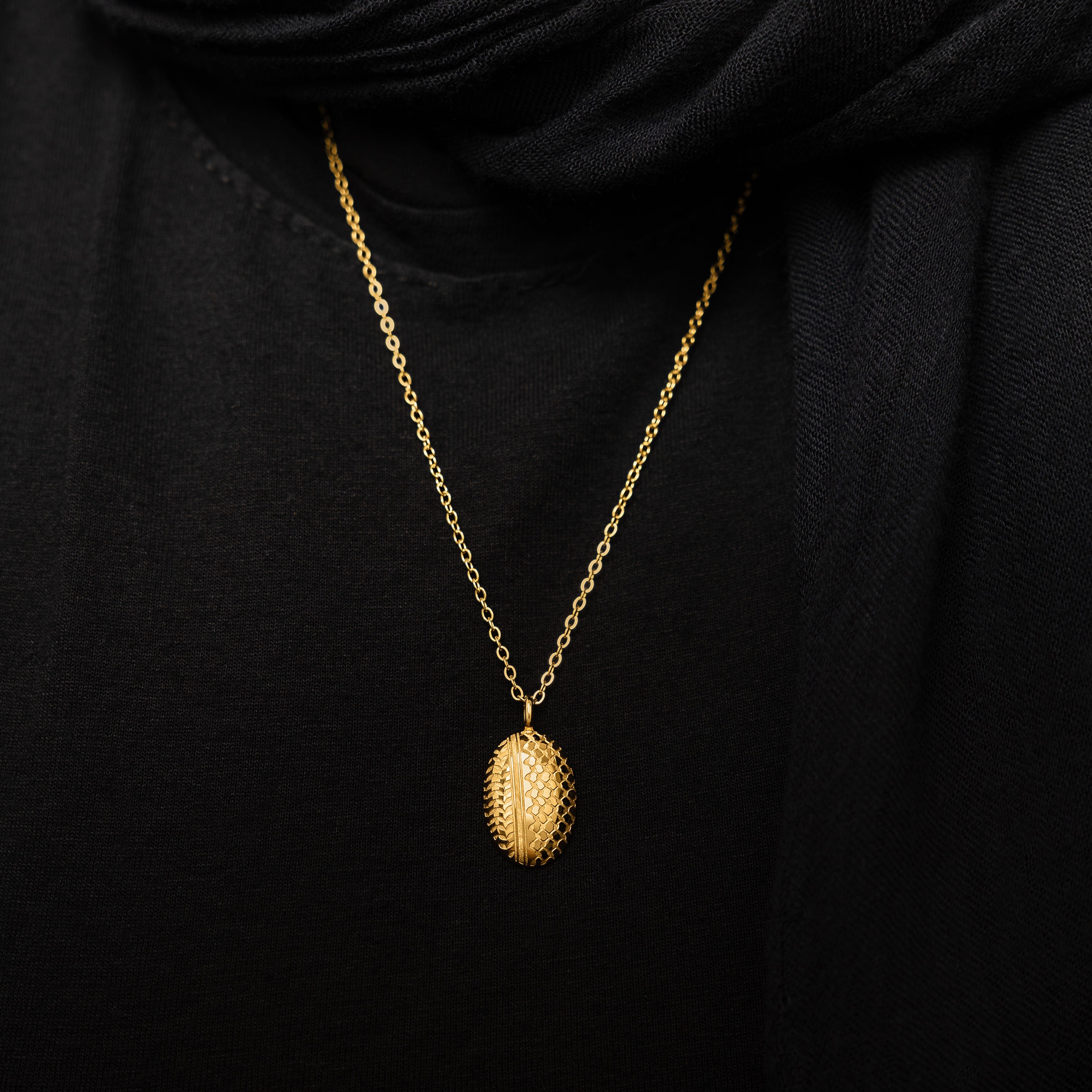 Full-length shot of womens jewelry styled with the 22-inch keffiyeh necklace