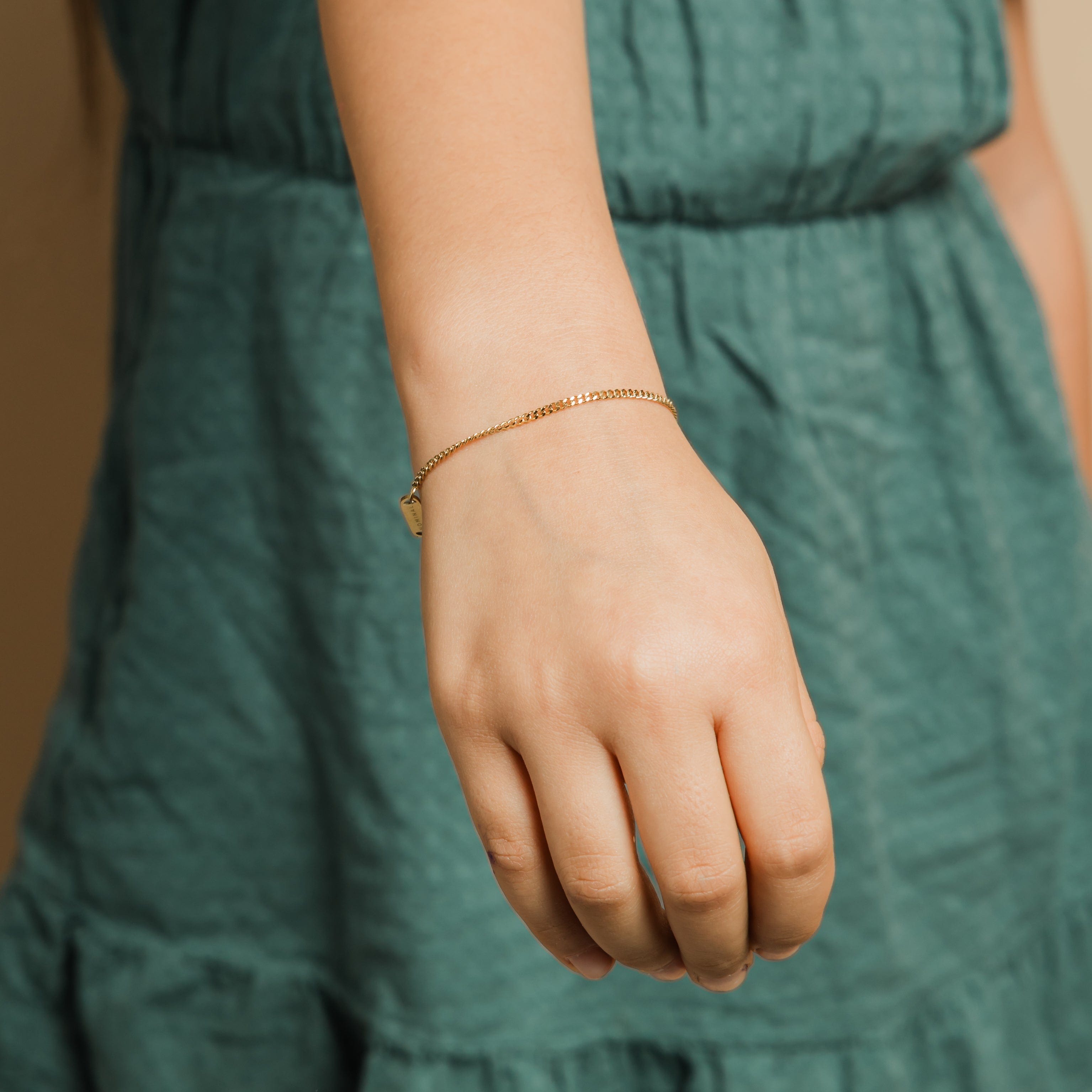 Little girl wearing the waterproof girls bracelet with warranty while playing outside.