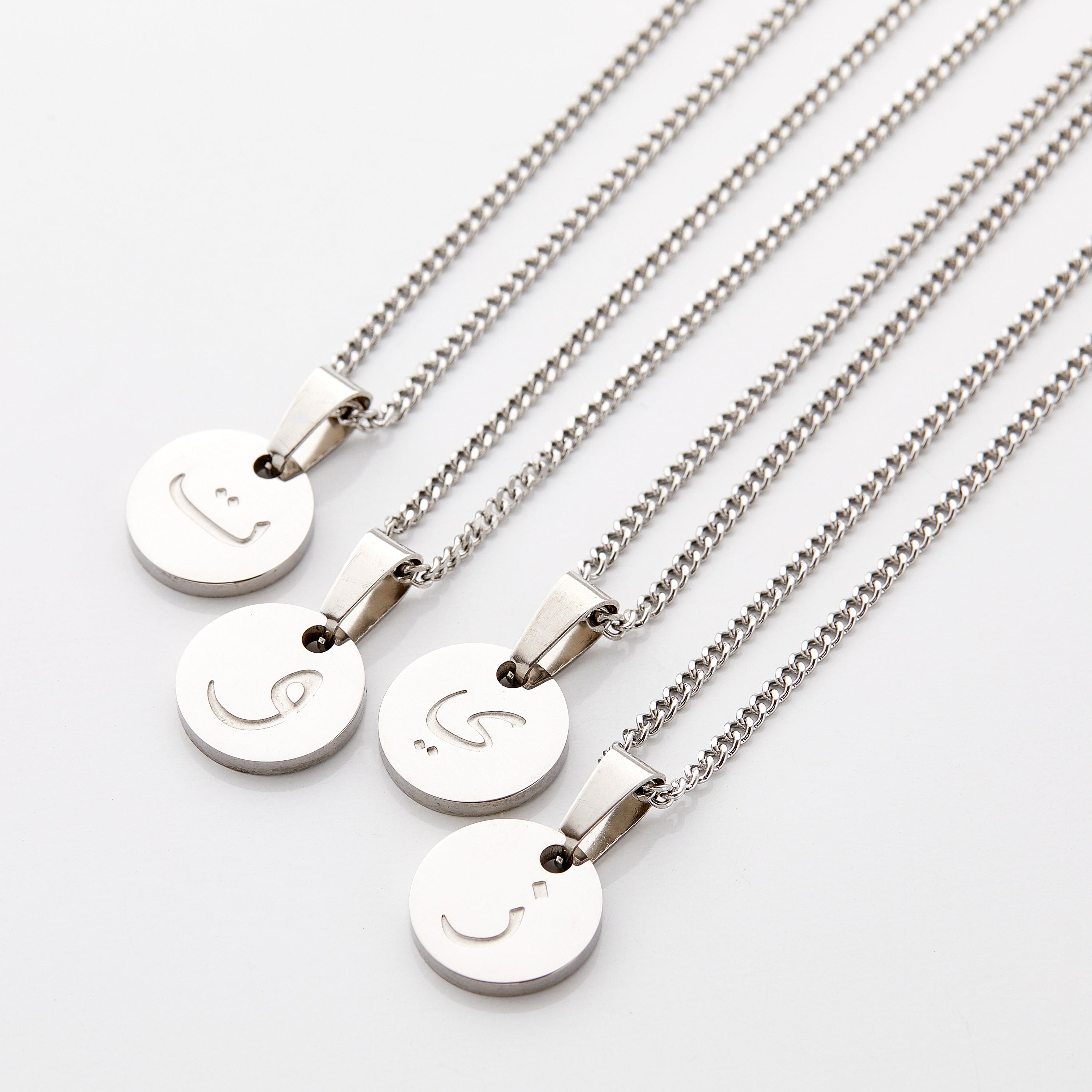 Elegant packaging of the personalized necklace in a velvet drawstring pouch, ready for gifting.