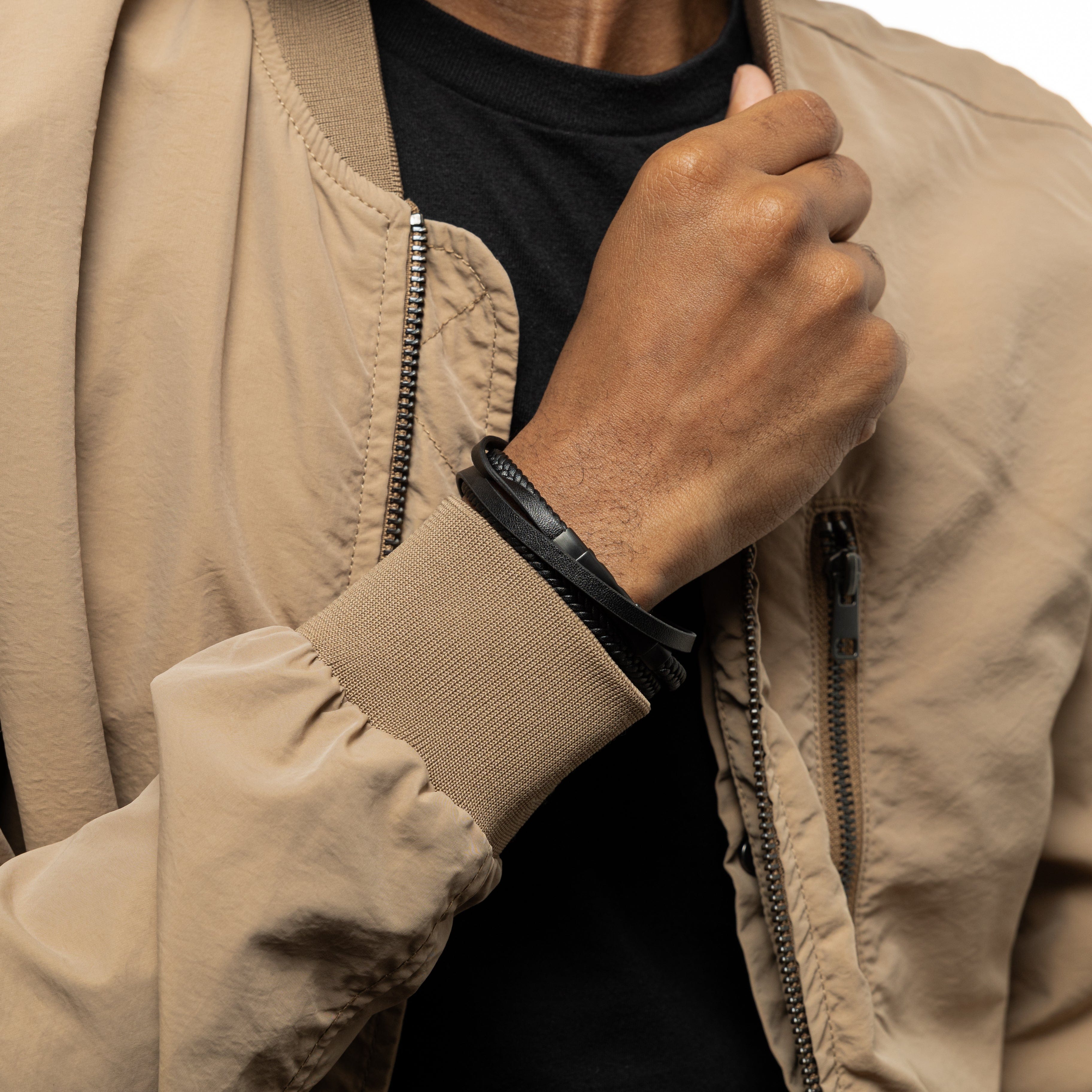 Close-up of stacked bracelet showing woven leather texture in brown tone, ideal for mens casual outfits