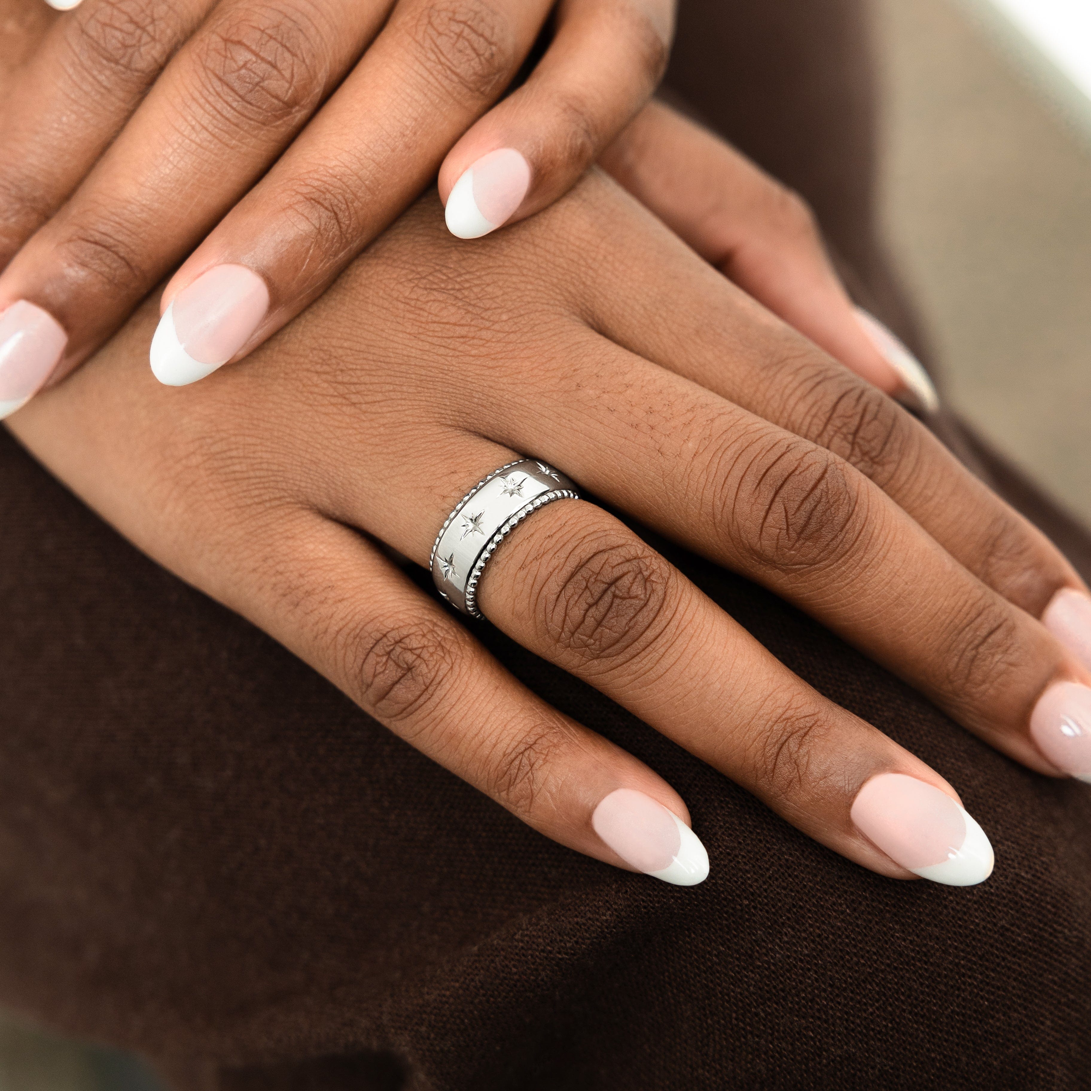 Close-up of Timeless Legacy Ring showing detailed embossing for meaningful wear.