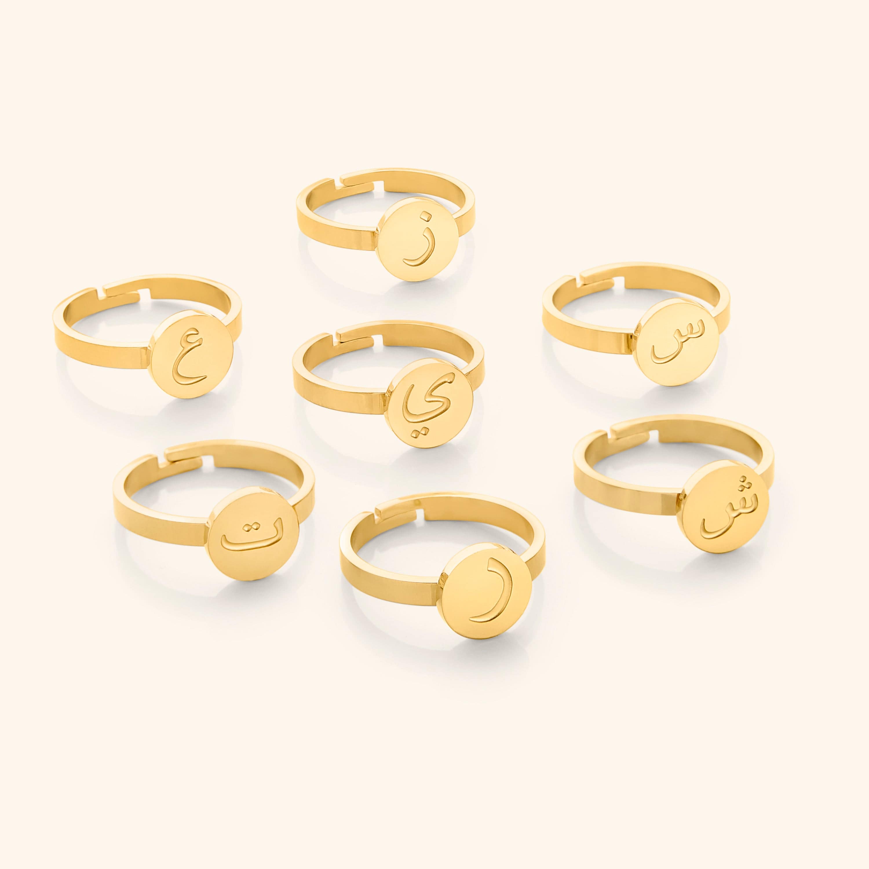 Elegant custom name letter ring showcasing the gold plated finish.